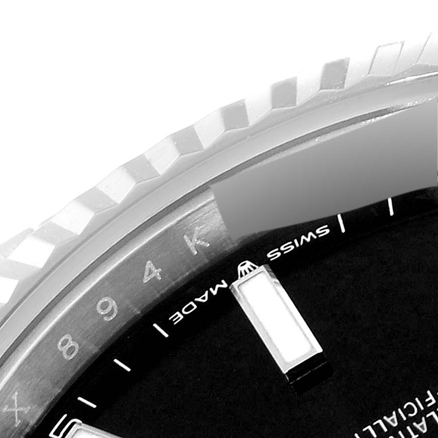 The image shows a close-up angle of the Rolex Datejust 41 126334 Men
s Stainless Steel Black Dial 126334 Men
s Stainless Steel Black Dial, highlighting parts of the bezel, dial, and hour markers.
