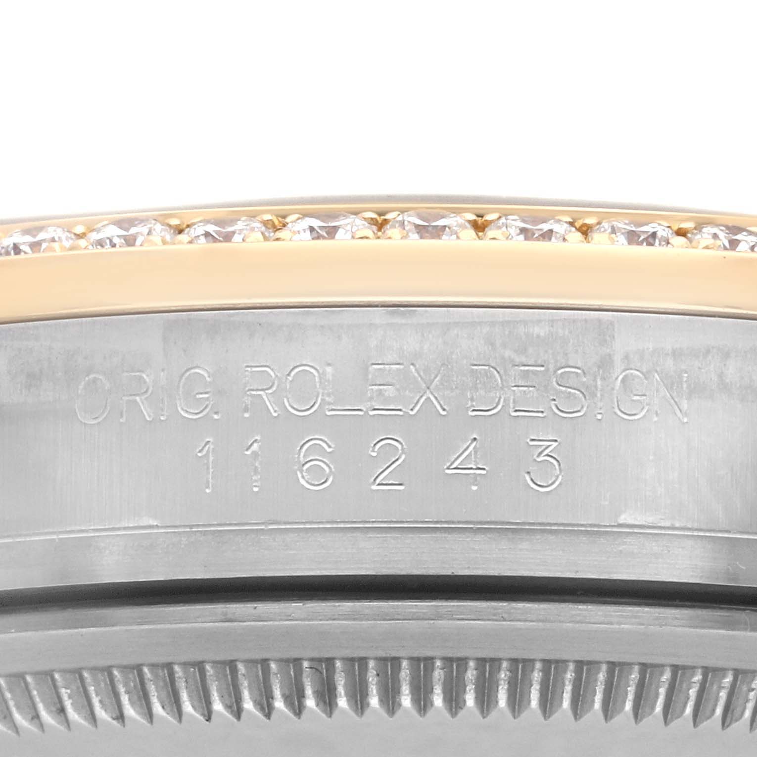 The image shows the side view of the bezel and case of the Rolex Datejust 116243 Men's Steel and Gold (two tone) Black Dial 116243 Men's Steel and Gold (two tone) Black Dial, highlighting the design engraving.