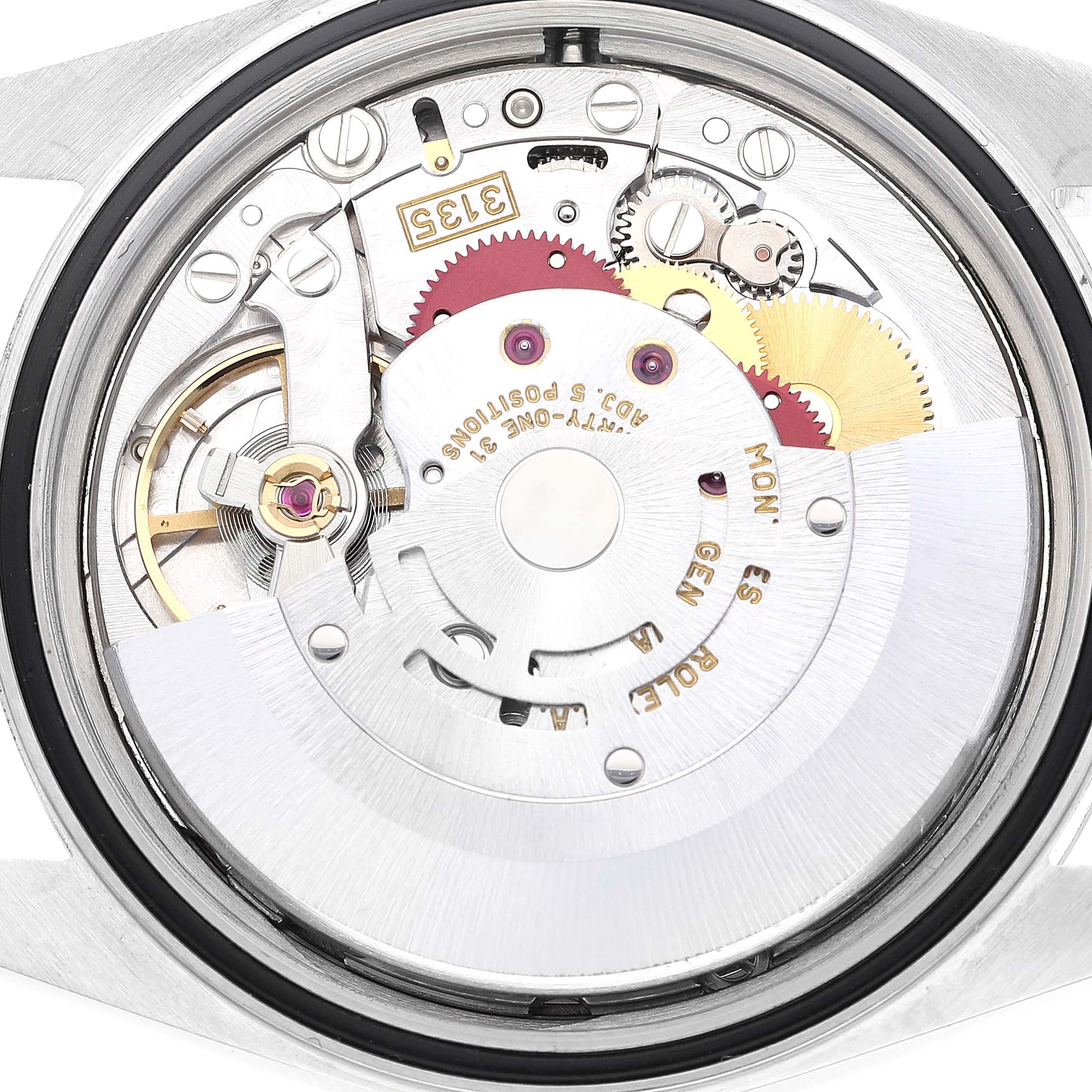 This image shows a close-up of the Rolex Datejust 16233 Men's Steel and Gold (two tone) Champagne Dial 16233 Men's Steel and Gold (two tone) Champagne Dial's movement mechanisms from a rear angle.