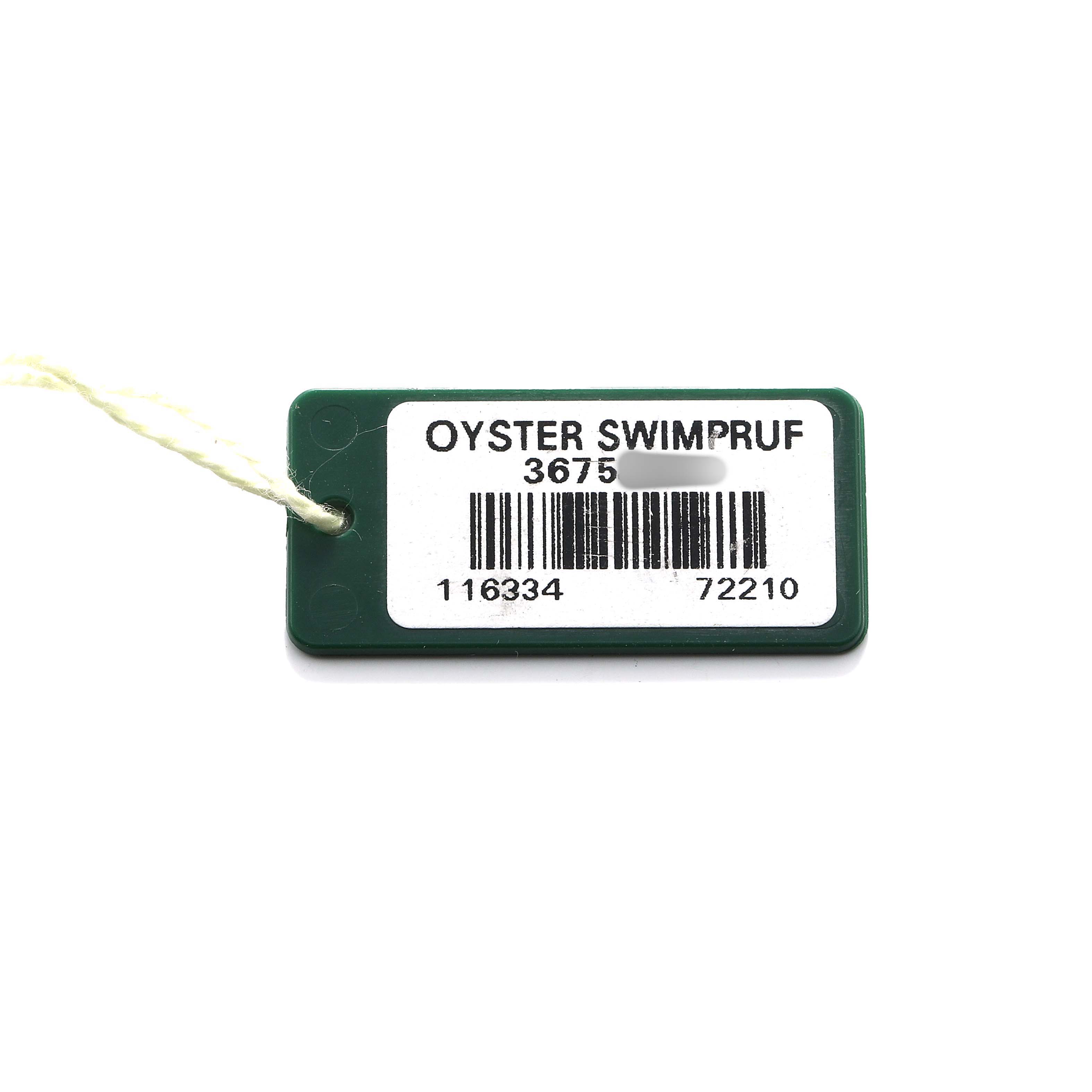 The image shows a green tag with "Oyster Swimpruf" for a Rolex Datejust 41 116334 Men's Stainless Steel Silver Dial watch.