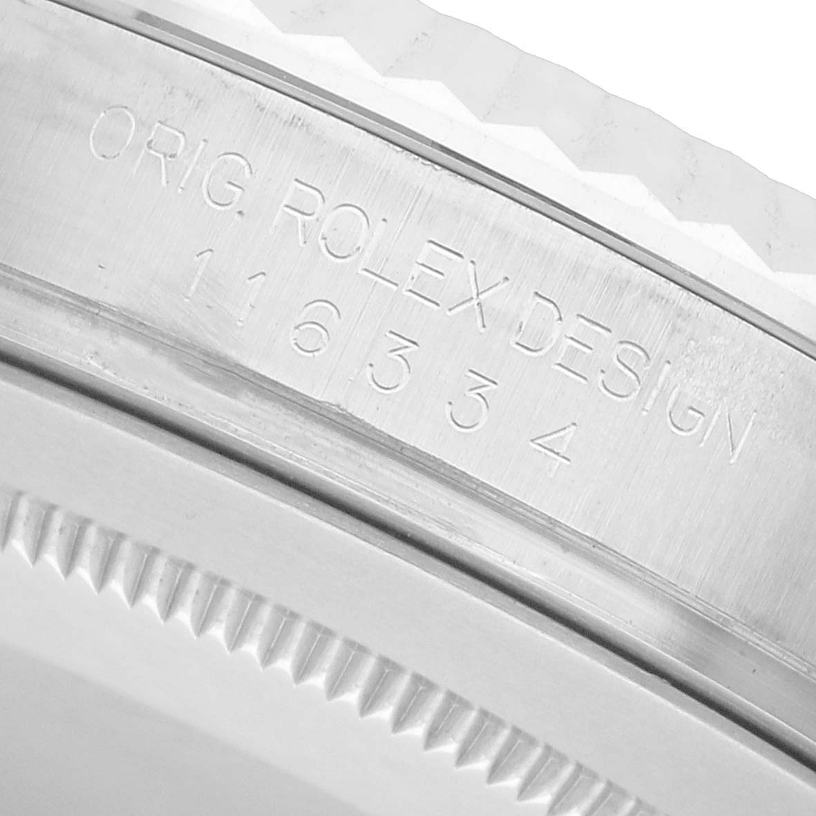The image shows an engraved part of the case of a Rolex Datejust 41 116334 Men's Stainless Steel Silver Dial, highlighting the model number.