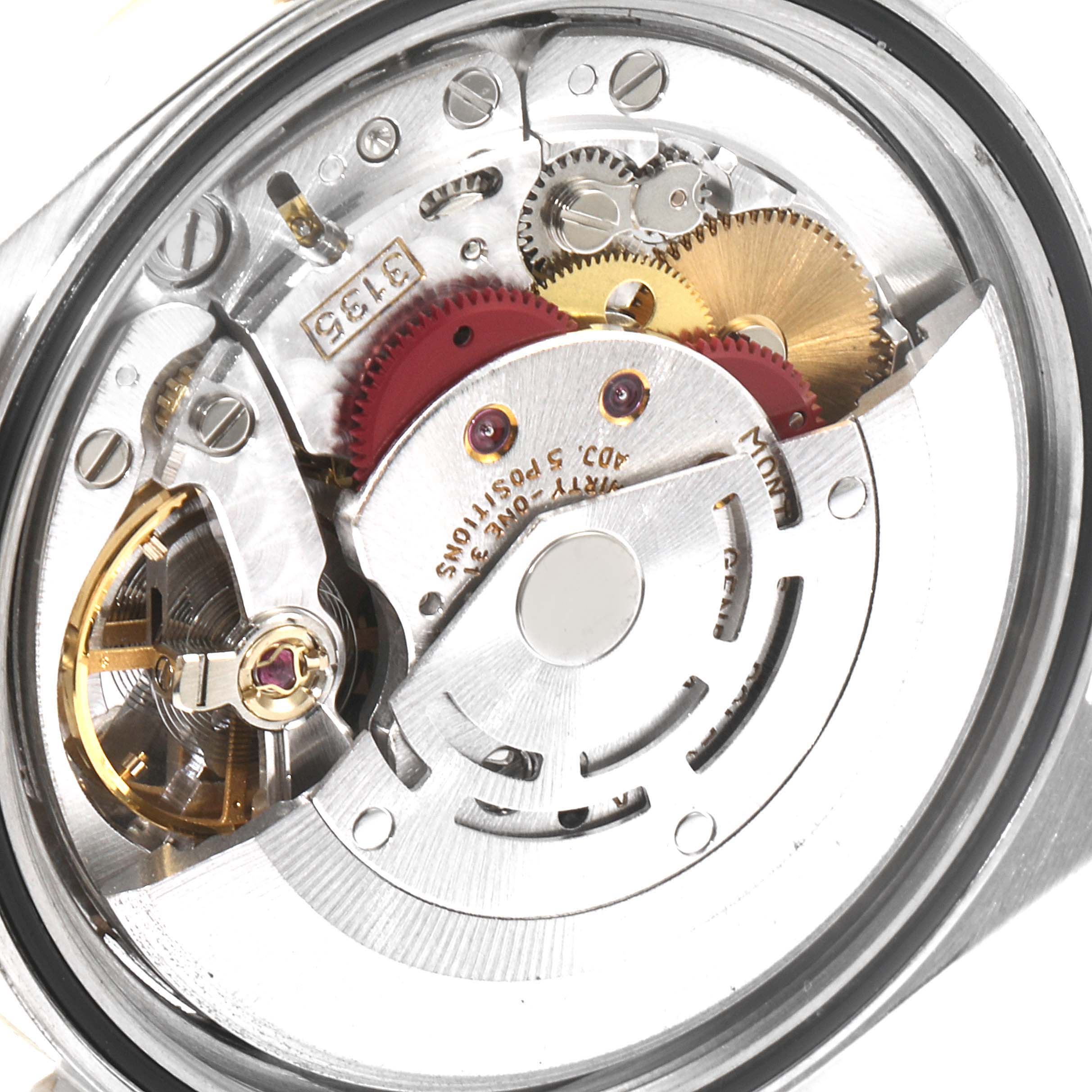 This image shows the internal mechanical movement components of a Rolex Datejust 16233 Men's Steel and Gold (two tone) Champagne Dial 16233 Men's Steel and Gold (two tone) Champagne Dial model watch from a close-up angle.