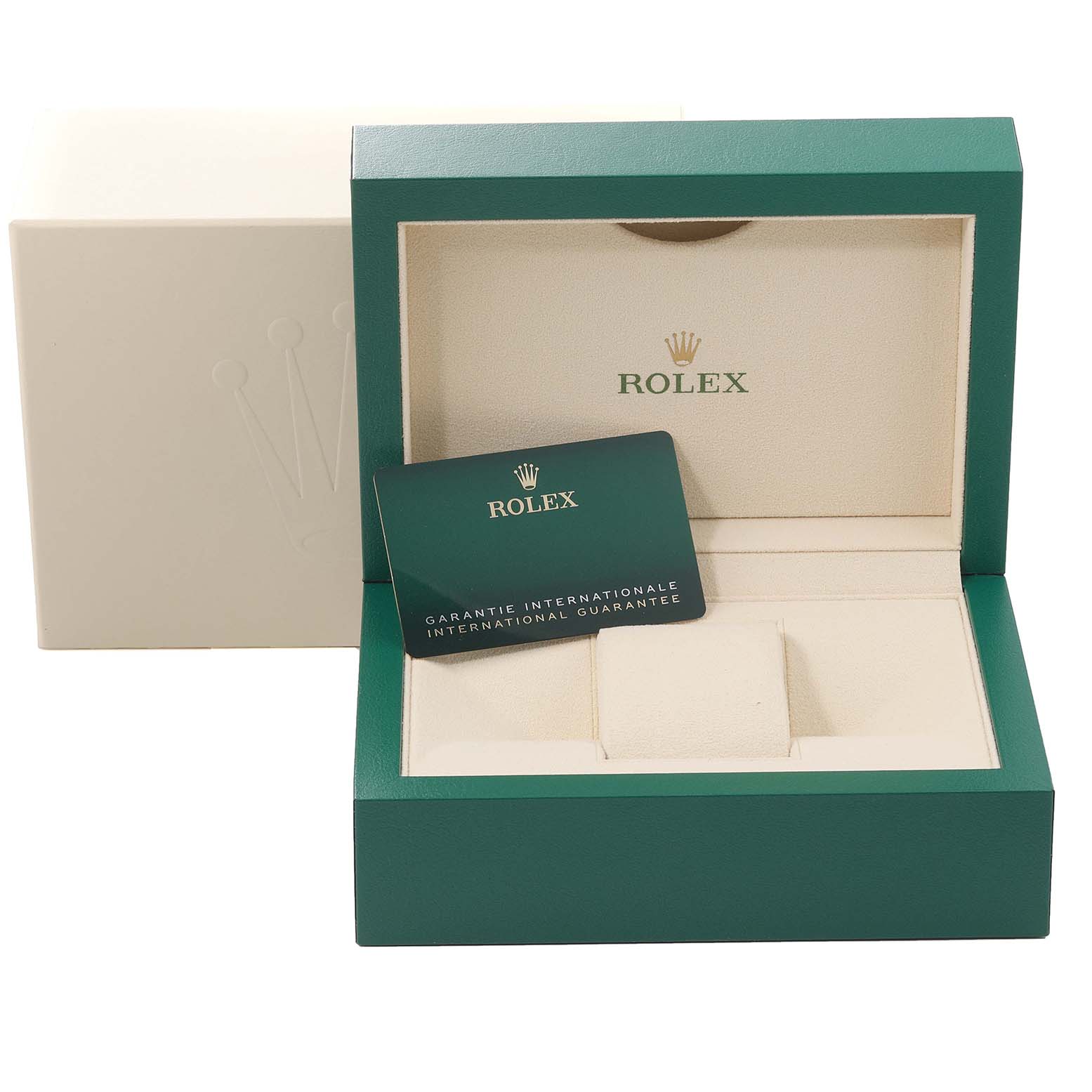 The image shows an open Rolex Datejust 126284RBR Men's Stainless Steel Blue Dial 126284RBR Men's Stainless Steel Blue Dial box, revealing the inner cushioned compartment and an international guarantee card.