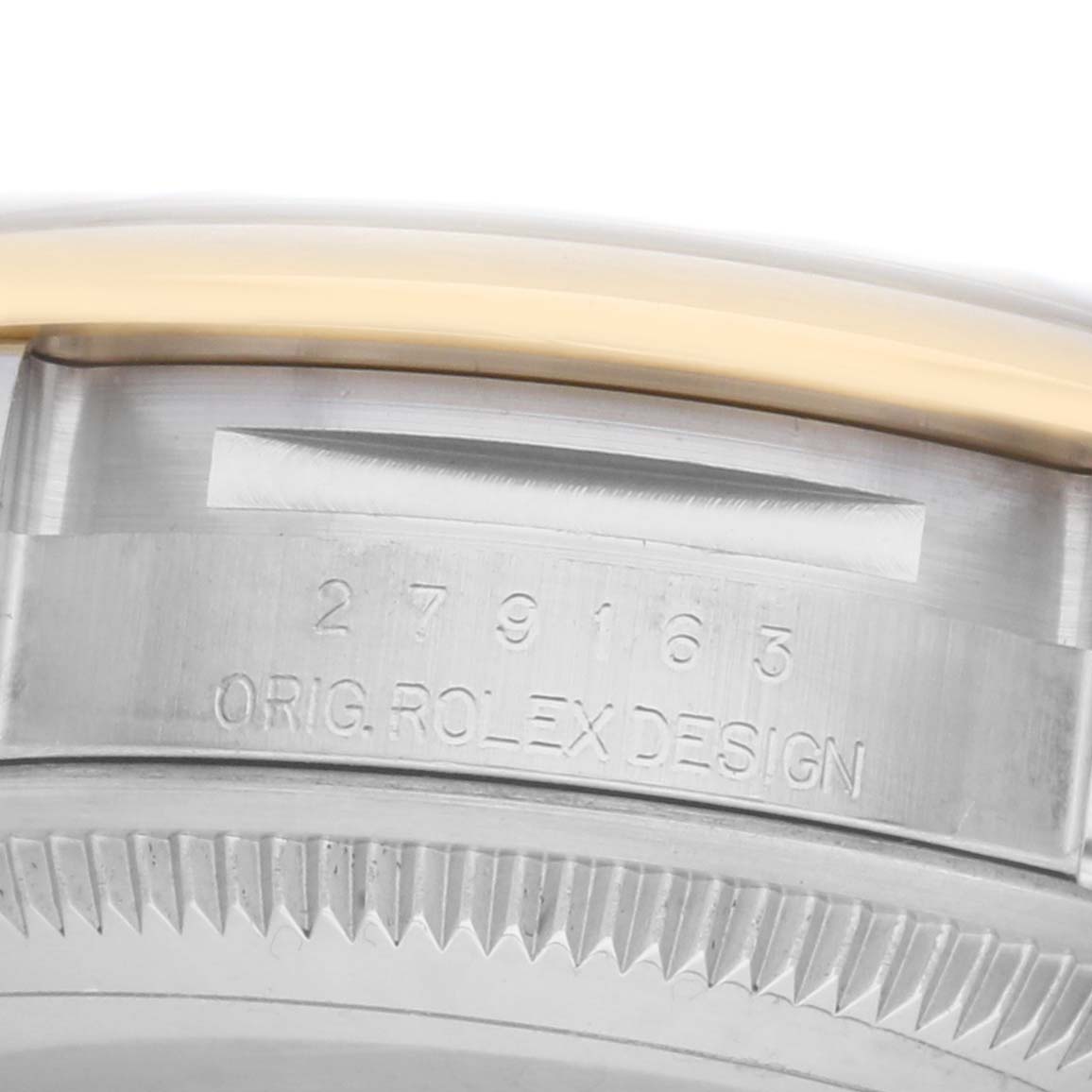 The image shows a close-up of the side of a Rolex Datejust 279163 Women's Steel and Gold (two tone) Champagne Dial watch, focusing on the bezel and engraved model number.