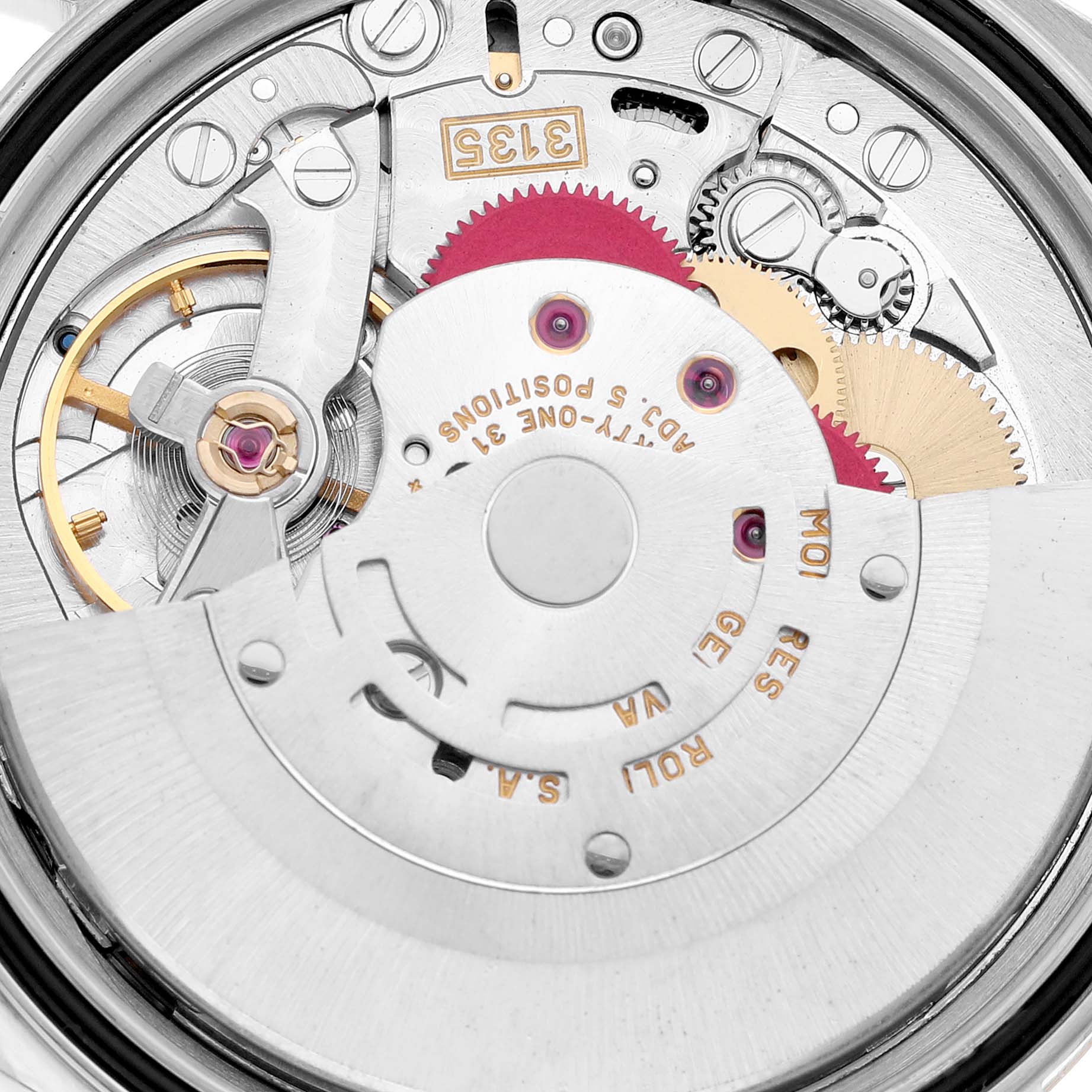 This image shows the intricate internal mechanism of a Rolex Datejust 16233 Men's Steel and Gold (two tone) White Dial 16233 Men's Steel and Gold (two tone) White Dial watch from a close-up angle.