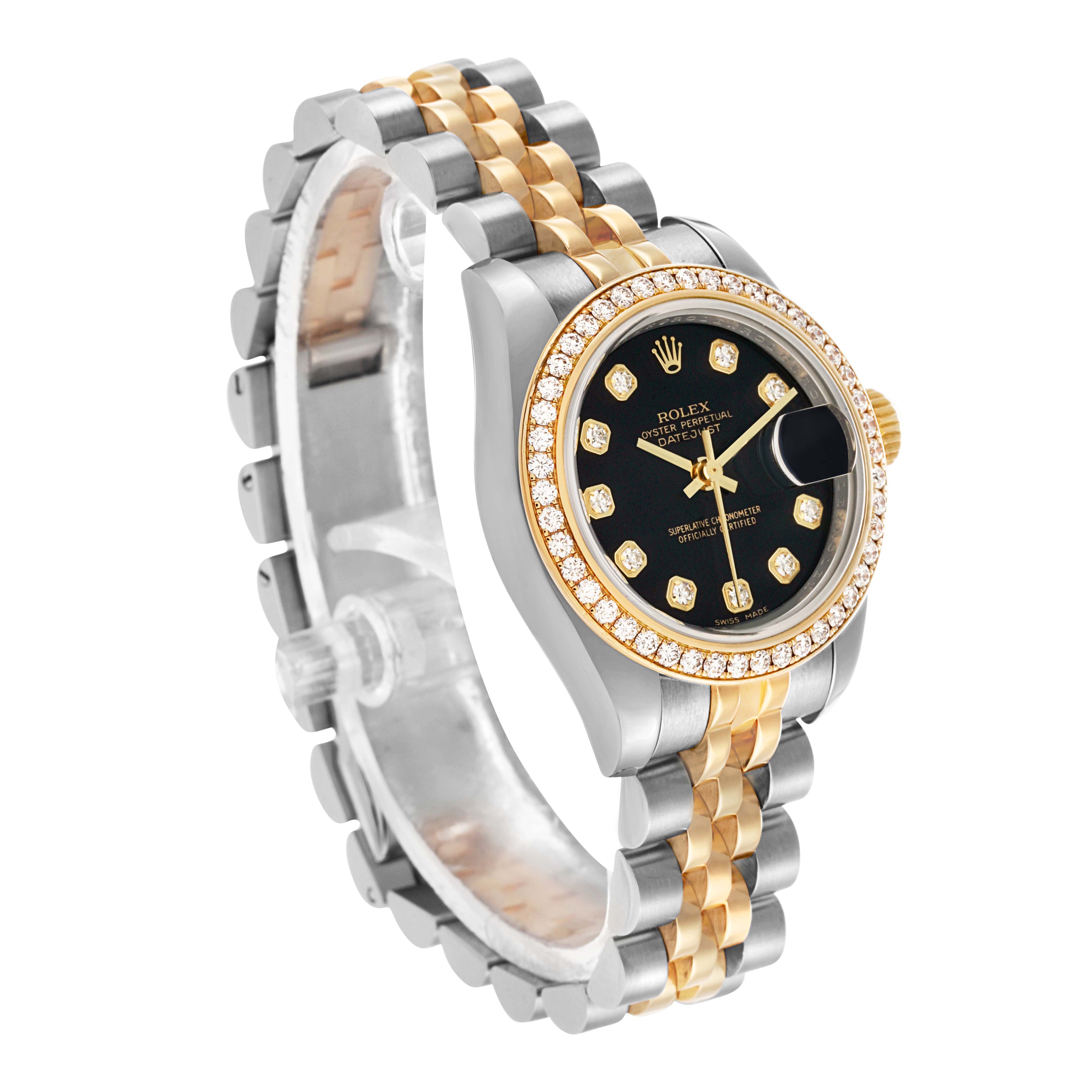 The Rolex Datejust 179383 Women's Steel and Gold (two tone) Black Dial watch is shown at a three-quarter angle, highlighting its two-tone bracelet, diamond bezel, and black dial.