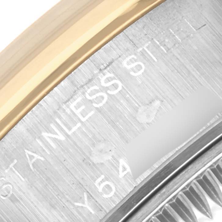 The image shows a close-up of the side of the case and bezel on a Rolex Datejust 79163 Women's Steel and Gold (two tone) Mother of Pearl Dial 79163 Women's Steel and Gold (two tone) Mother of Pearl Dial.