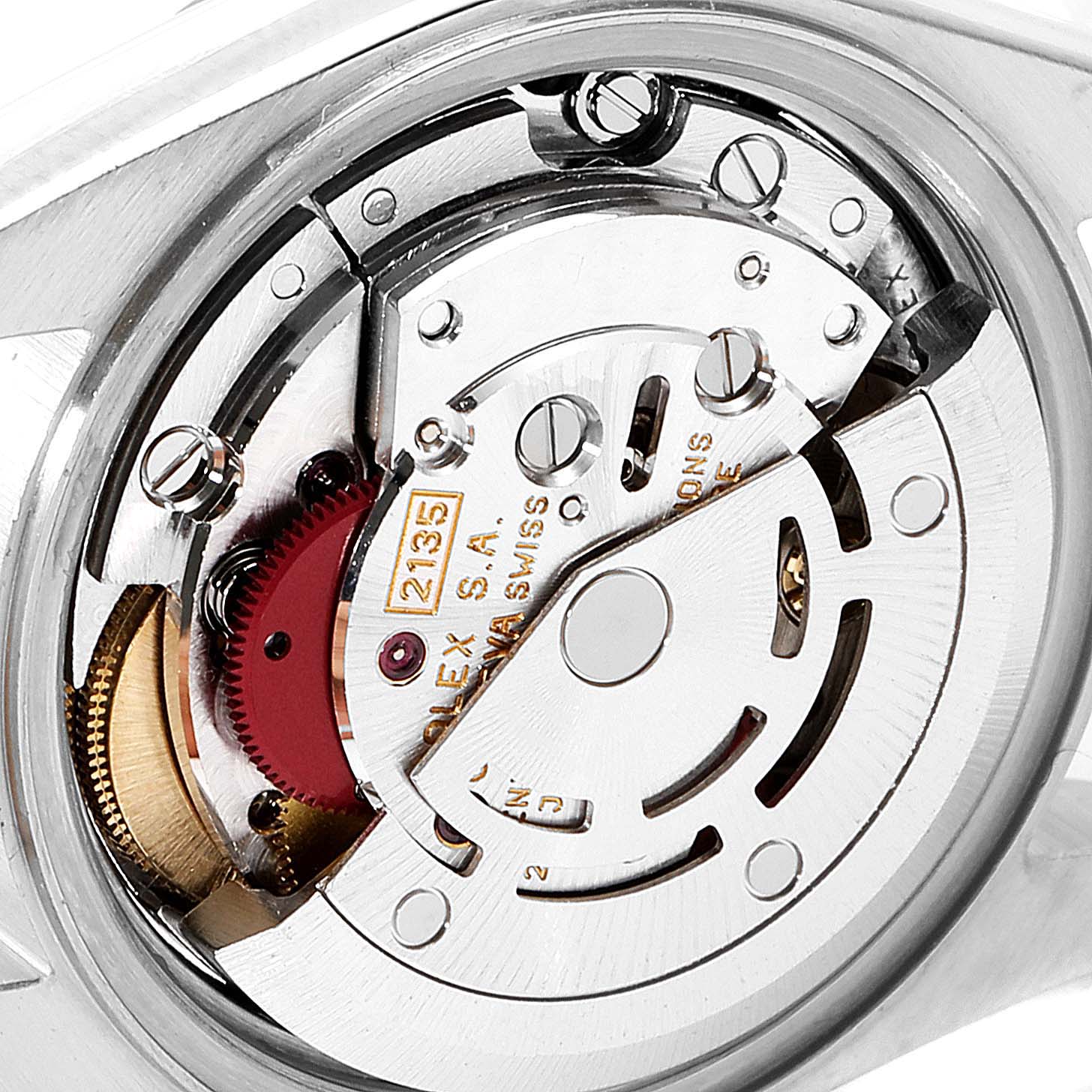 The image shows a close-up of the movement mechanism of a Rolex Datejust 69173 Women
s Steel and Gold (two tone) Silver Dial 69173 Women
s Steel and Gold (two tone) Silver Dial watch.