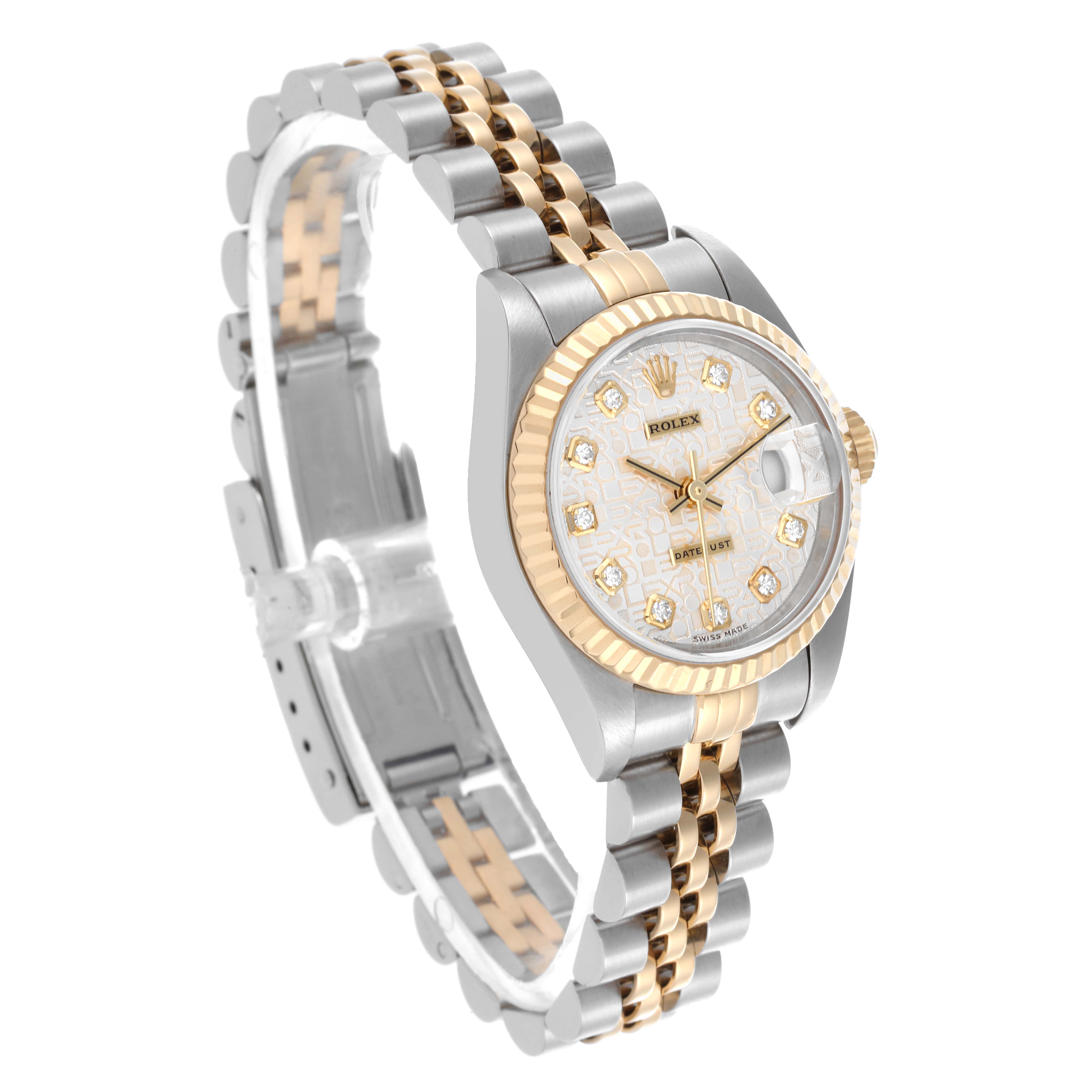 The Rolex Datejust 79173 Women's Steel and Gold (two tone) Silver Dial 79173 Women's Steel and Gold (two tone) Silver Dial watch is shown at an angled view, highlighting the face, bezel, and two-tone bracelet.