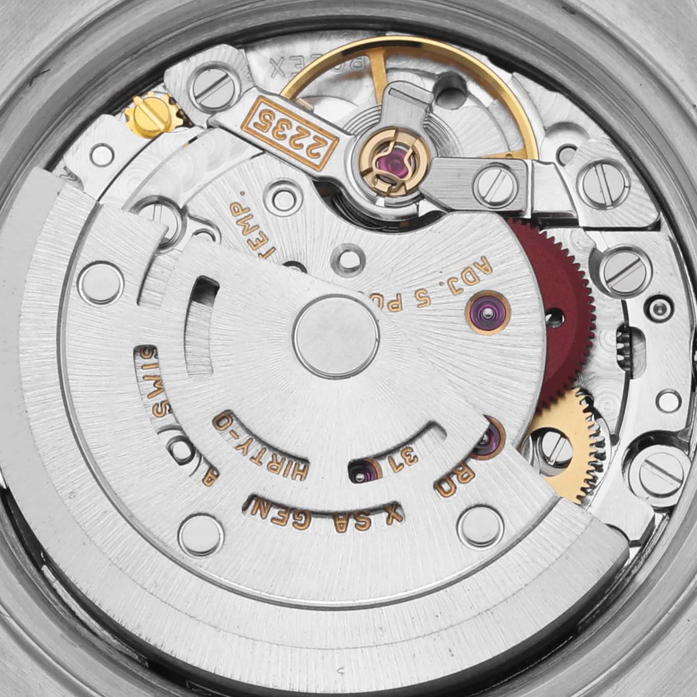 The image shows a close-up of the movement inside a Rolex Datejust 79173 Women's Steel and Gold (two tone) Silver Dial 79173 Women's Steel and Gold (two tone) Silver Dial, highlighting gears and rotors.