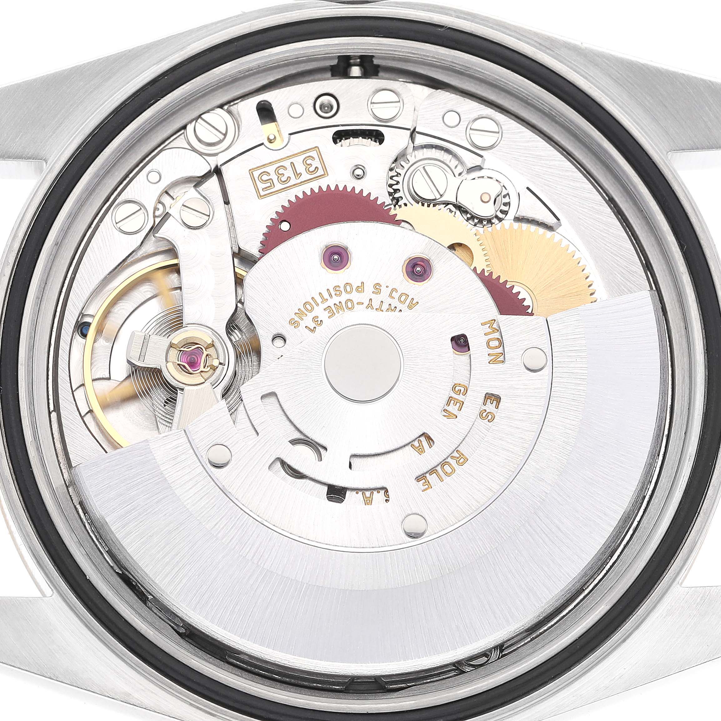 This image shows the internal mechanism or movement of a Rolex Datejust 16203 Men's Steel and Gold (two tone) Grey Dial 16203 Men's Steel and Gold (two tone) Grey Dial watch viewed from the back.