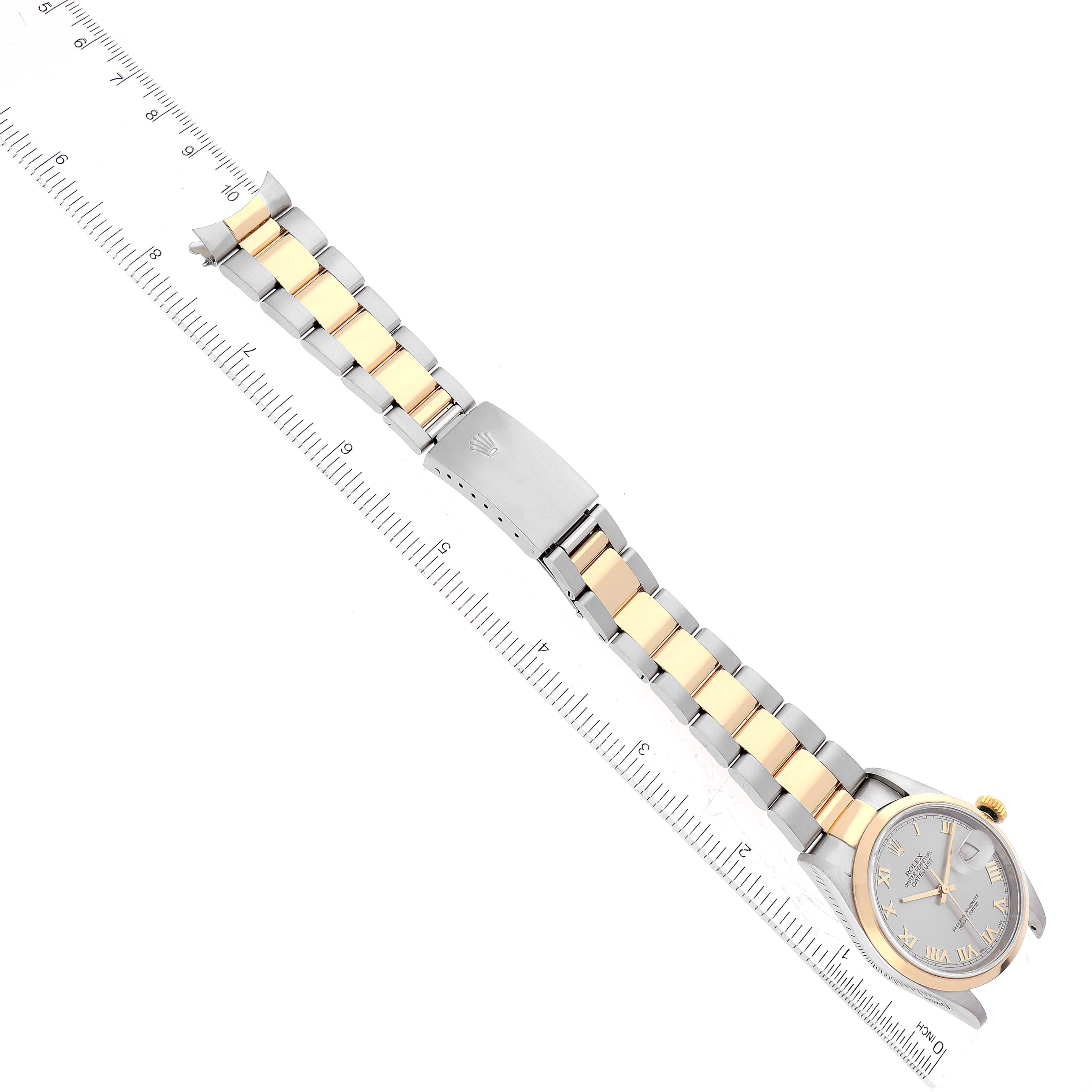 The image shows a Rolex Datejust 16203 Men's Steel and Gold (two tone) Grey Dial 16203 Men's Steel and Gold (two tone) Grey Dial watch from a top-down angle, highlighting its two-tone bracelet, clasp, and face.