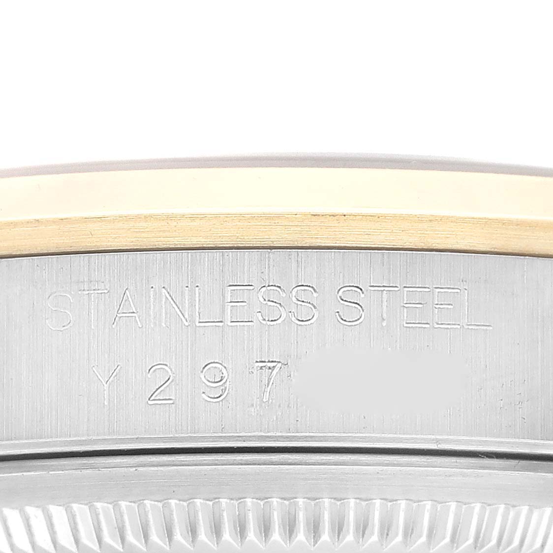 This image shows a close-up of the stainless steel case and model number engraving on a Rolex Datejust 16203 Men's Steel and Gold (two tone) Grey Dial 16203 Men's Steel and Gold (two tone) Grey Dial watch.