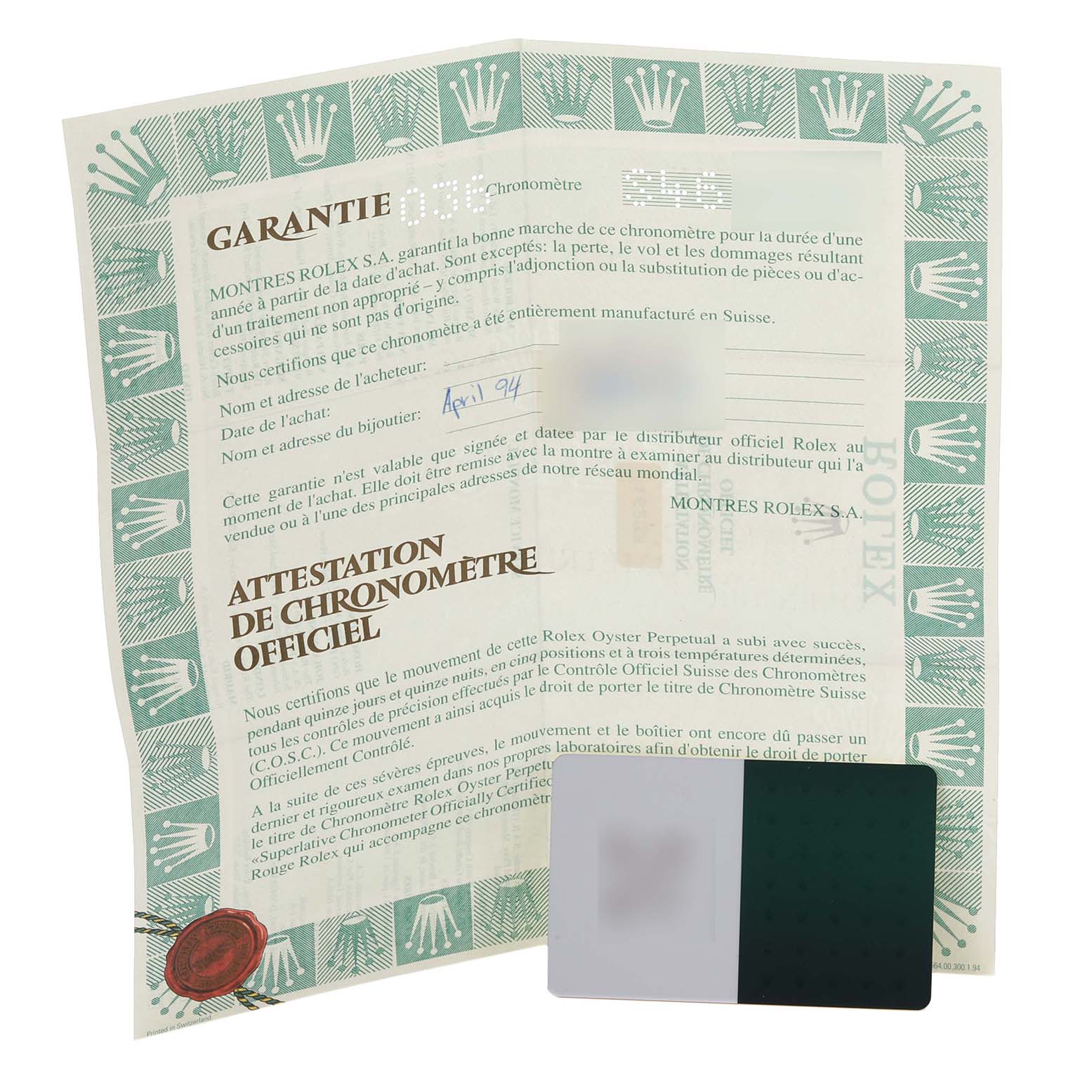 The image shows a Rolex Datejust 16233 Men
s Steel and Gold (two tone) White Dial 16233 Men
s Steel and Gold (two tone) White Dial warranty certificate and chronometer certification, along with a partially visible card.