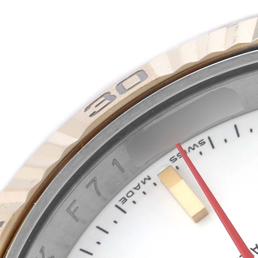 The image shows a close-up of the bezel and part of the dial of the Rolex Turn-o-Graph 116263 Men's Steel and Gold (two tone) White Dial, highlighting the "30" on the bezel.