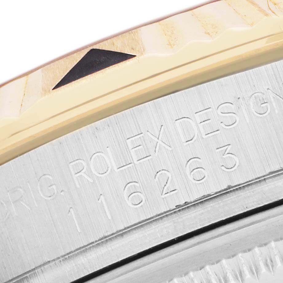 The image shows a close-up of the Turn-o-Graph bezel and engraved case side of a Rolex watch.