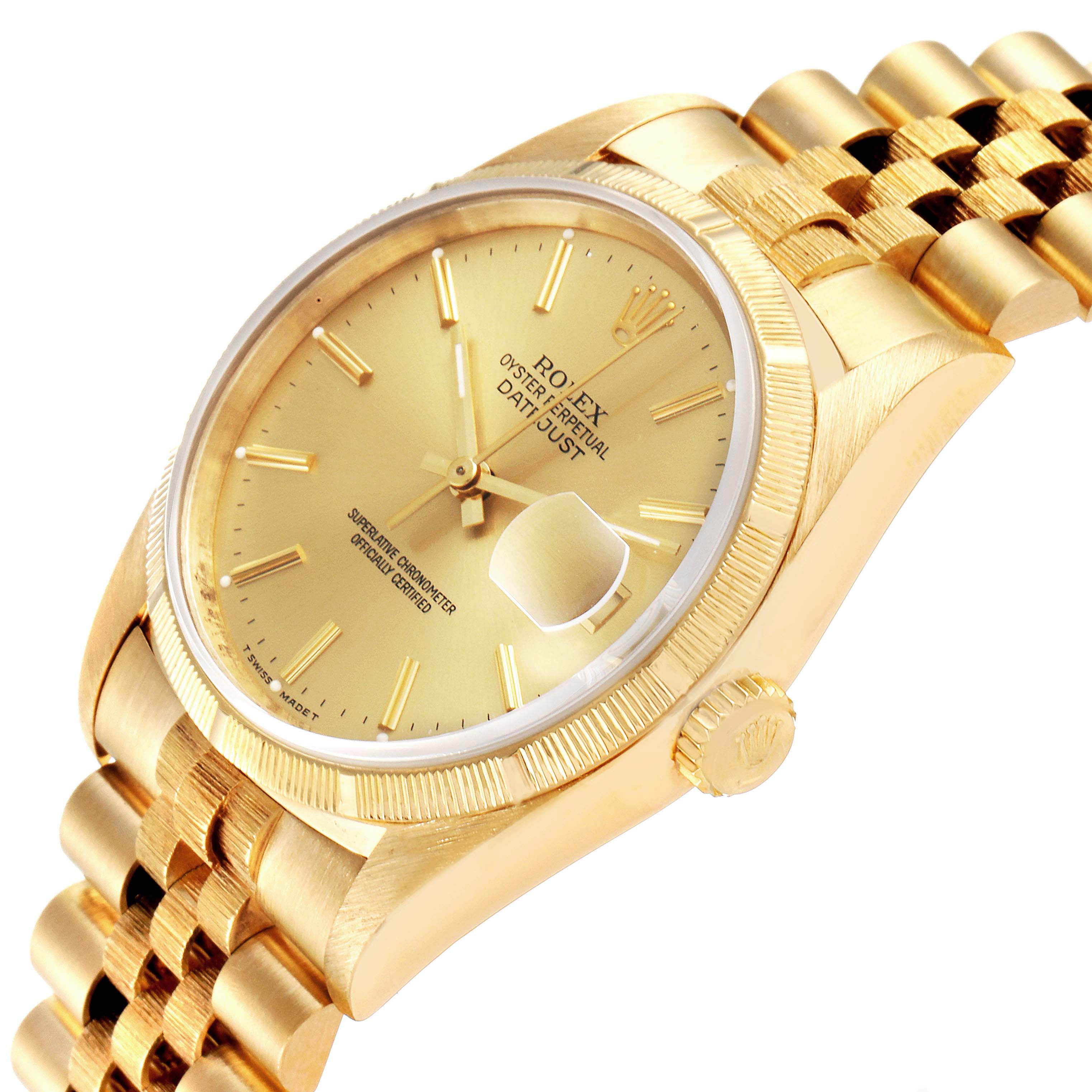This image shows a close-up angle of the Rolex Datejust 16248 Men's Yellow Gold Champagne Dial 16248 Men's Yellow Gold Champagne Dial watch featuring its face, fluted bezel, and part of the bracelet.