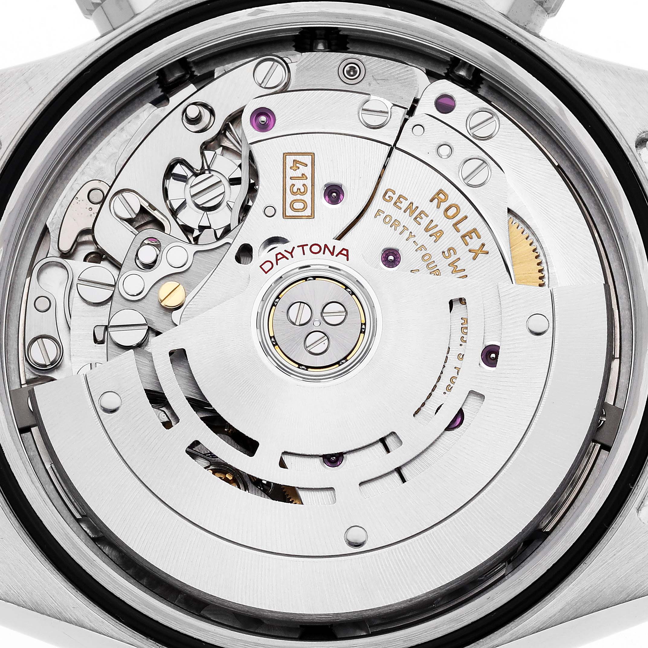 The image shows the movement of a Rolex Daytona 116500 Men's Stainless Steel Black Dial watch from a top-down angle, highlighting the intricate inner mechanisms.