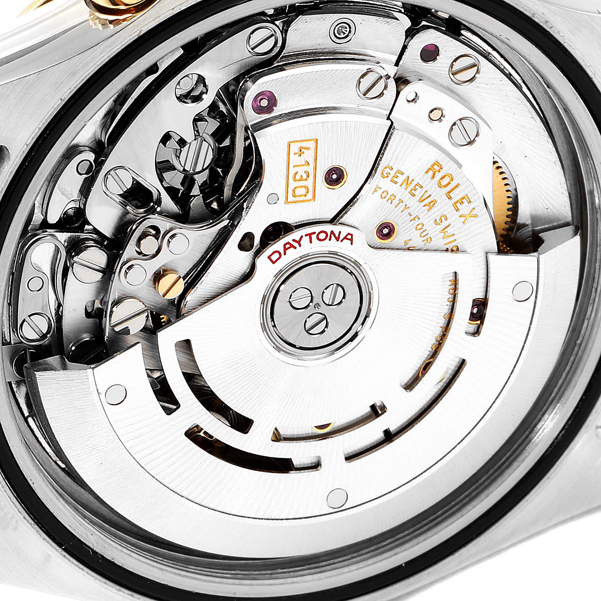 This image shows a close-up of the inner mechanical movement of a Rolex Daytona 116523 Men's Steel and Gold (two tone) Grey Dial 116523 Men's Steel and Gold (two tone) Grey Dial watch.
