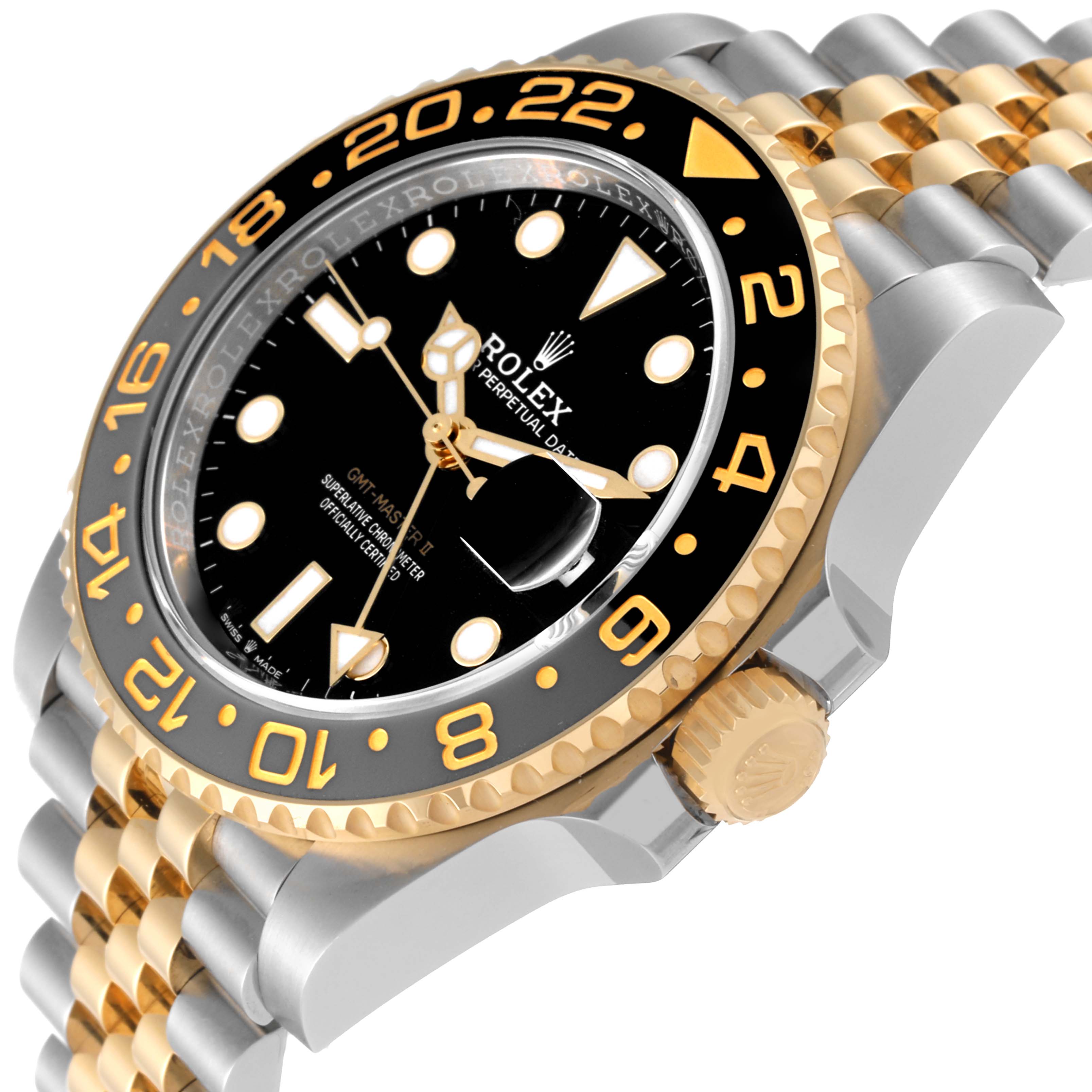 This image shows a Rolex GMT-Master 126713GRNR Men's Steel and Gold (two tone) Black Dial 126713GRNR Men's Steel and Gold (two tone) Black Dial watch from an oblique angle, highlighting the crown, bezel, dial, and part of the bracelet.