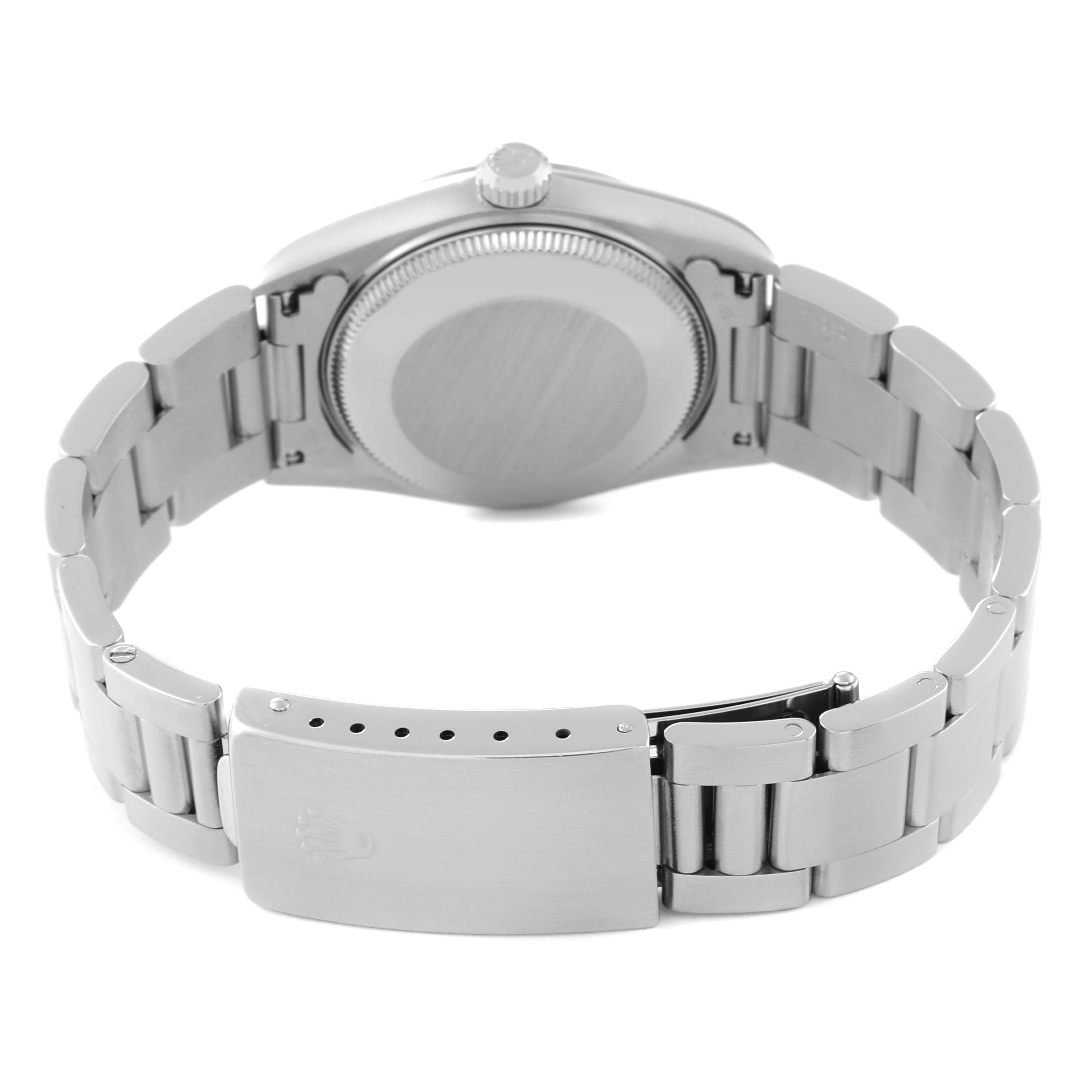 The image shows the back case and bracelet clasp of a Rolex Mid-Size 67480 Women
s Stainless Steel Blue Dial 67480 Women
s Stainless Steel Blue Dial watch, viewed from the back.