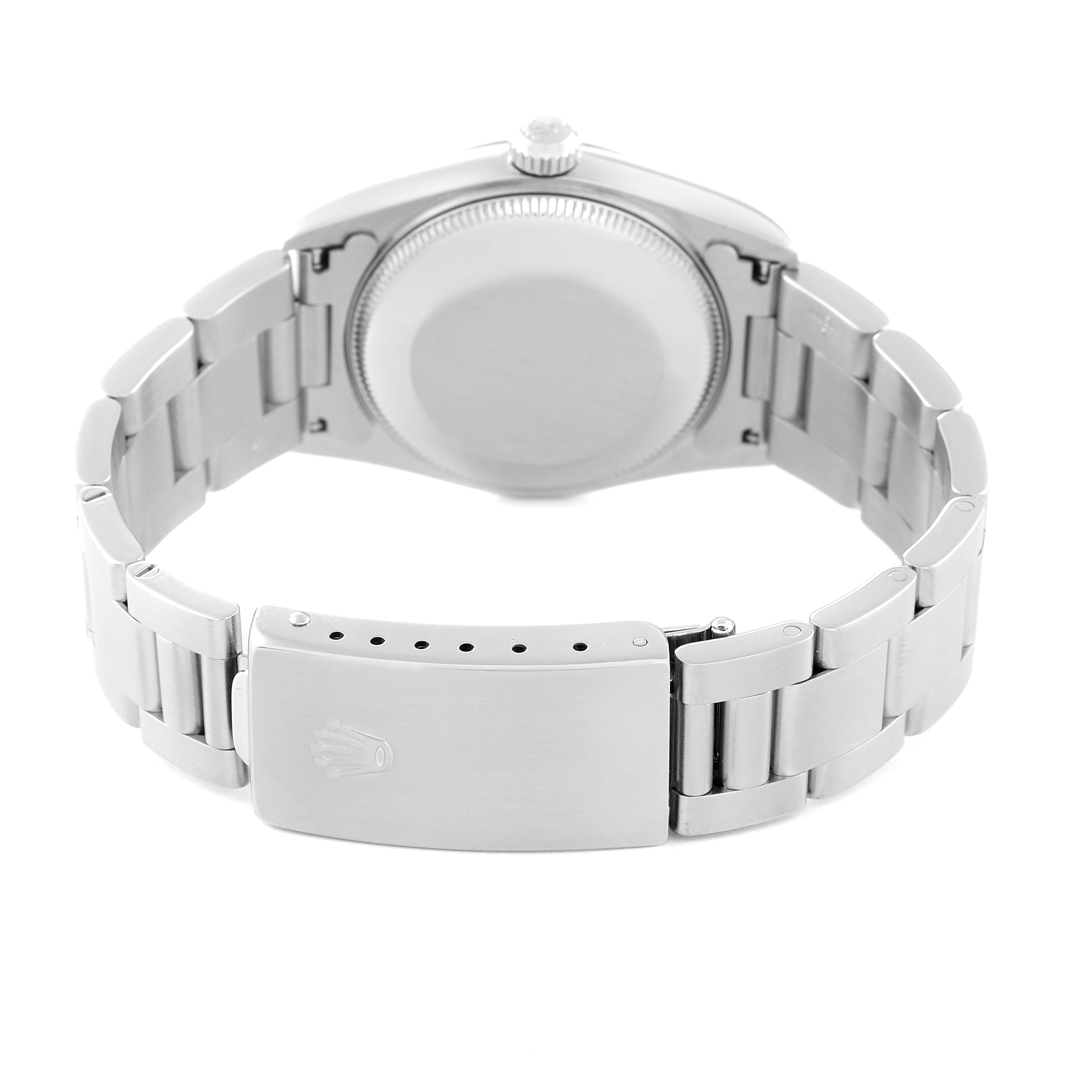 This image shows the back view of a Mid-Size Rolex watch, highlighting the case back and the bracelet with the clasp.