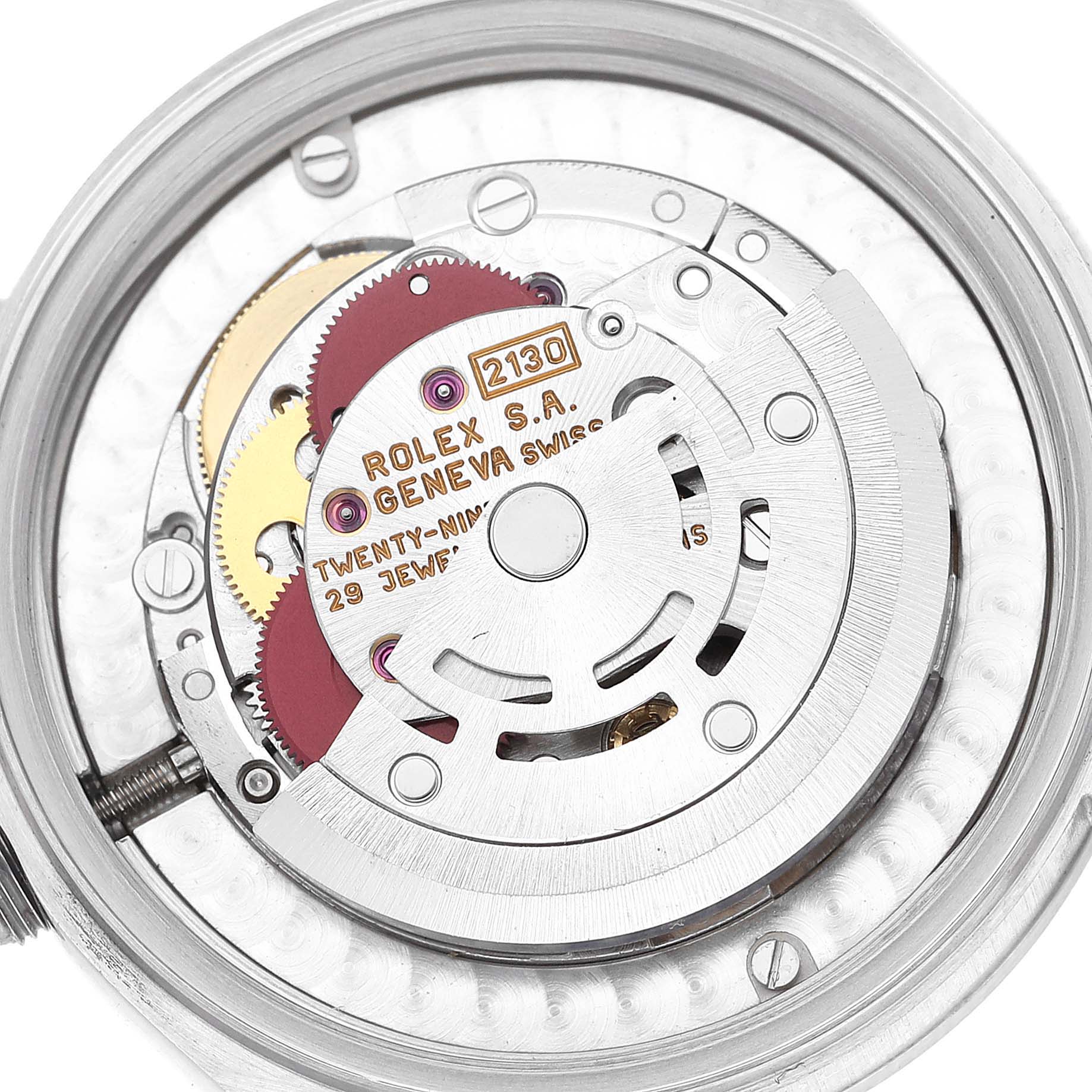 The image shows the inner mechanical movement parts of a Rolex Mid-Size 67480 Women
s Stainless Steel Blue Dial 67480 Women
s Stainless Steel Blue Dial model watch at a top-down angle.