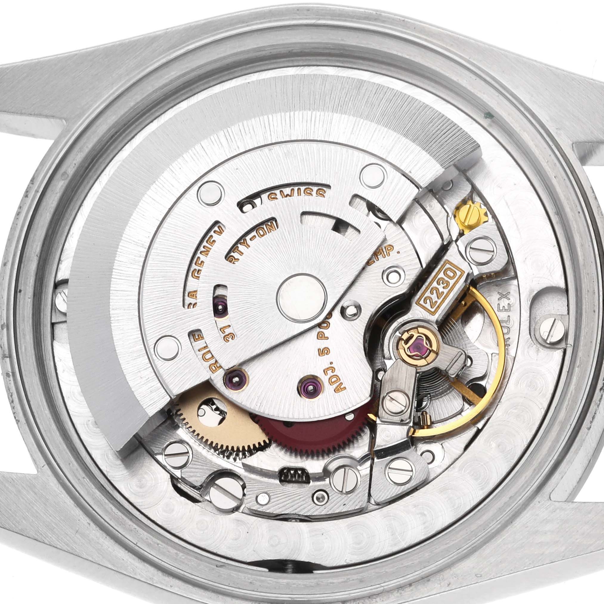 This image shows the internal mechanism of a Rolex Mid-Size 77080 Women's Stainless Steel Black Dial 77080 Women's Stainless Steel Black Dial watch from a top-down angle.