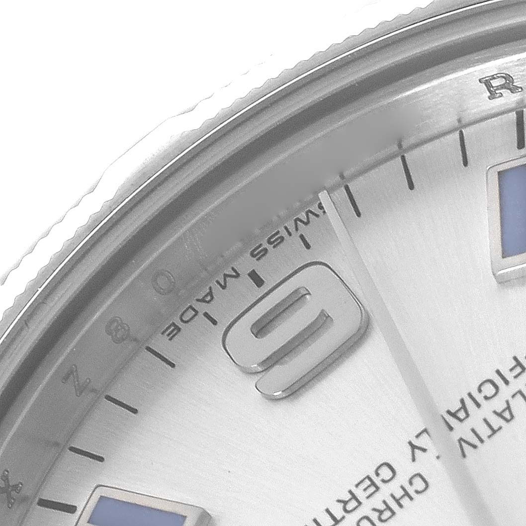The image shows a partial close-up of a Rolex Mid-Size 177210 Women's Stainless Steel Silver Dial 177210 Women's Stainless Steel Silver Dial watch face, highlighting the 9 o'clock marker and "SWISS MADE."