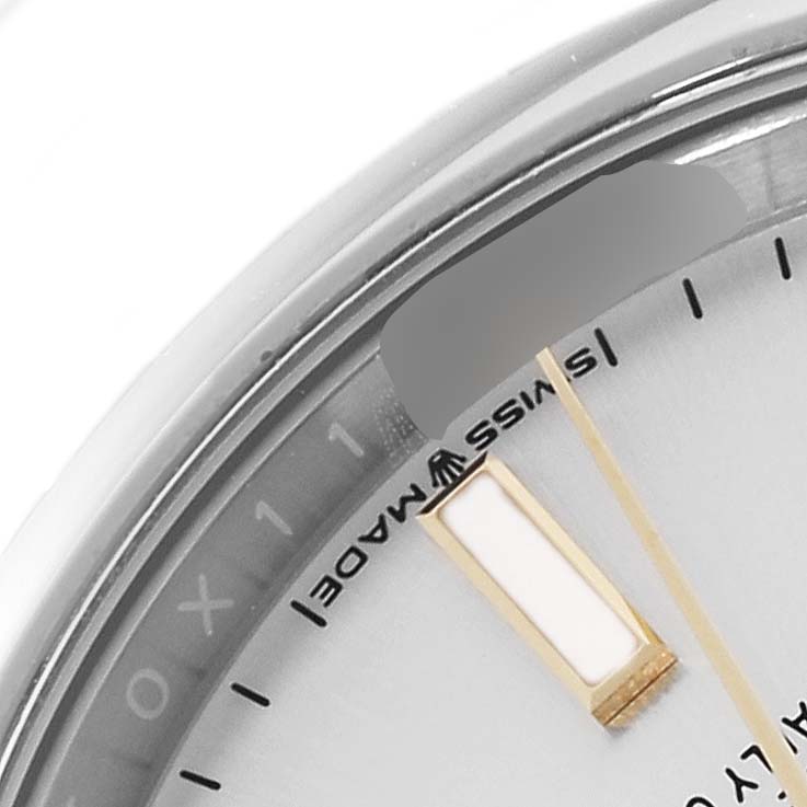 This image shows a close-up of the dial, bezel, and markers of a Rolex Oyster Perpetual 124200 Men
s Stainless Steel Silver Dial 124200 Men
s Stainless Steel Silver Dial watch.