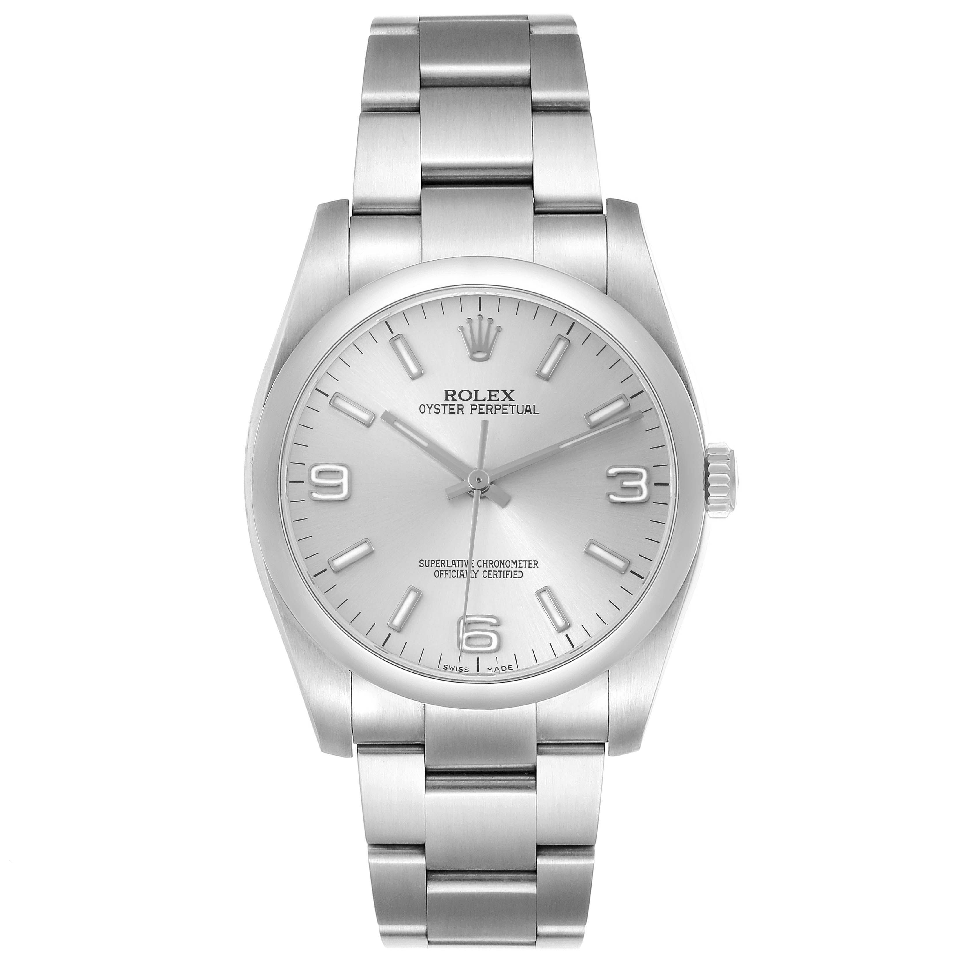 The Rolex Oyster Perpetual 116000 Men's Stainless Steel Silver Dial 116000 Men's Stainless Steel Silver Dial watch is shown from the front, displaying the face, bezel, crown, and bracelet.