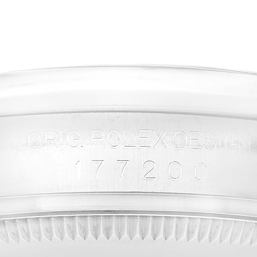 The image shows a close-up of the side of a Mid-Size Rolex watch, highlighting the serial number and "ORIG. ROLEX DESIGN" engraving.