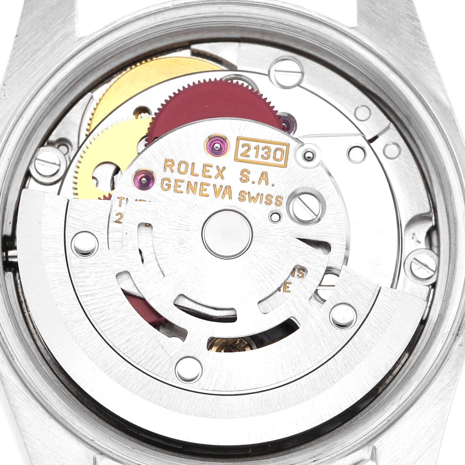 The image shows the internal mechanism of a Rolex Oyster Perpetual 67180 Women's Stainless Steel Blue Dial 67180 Women's Stainless Steel Blue Dial, focusing on its movement and intricate gears.