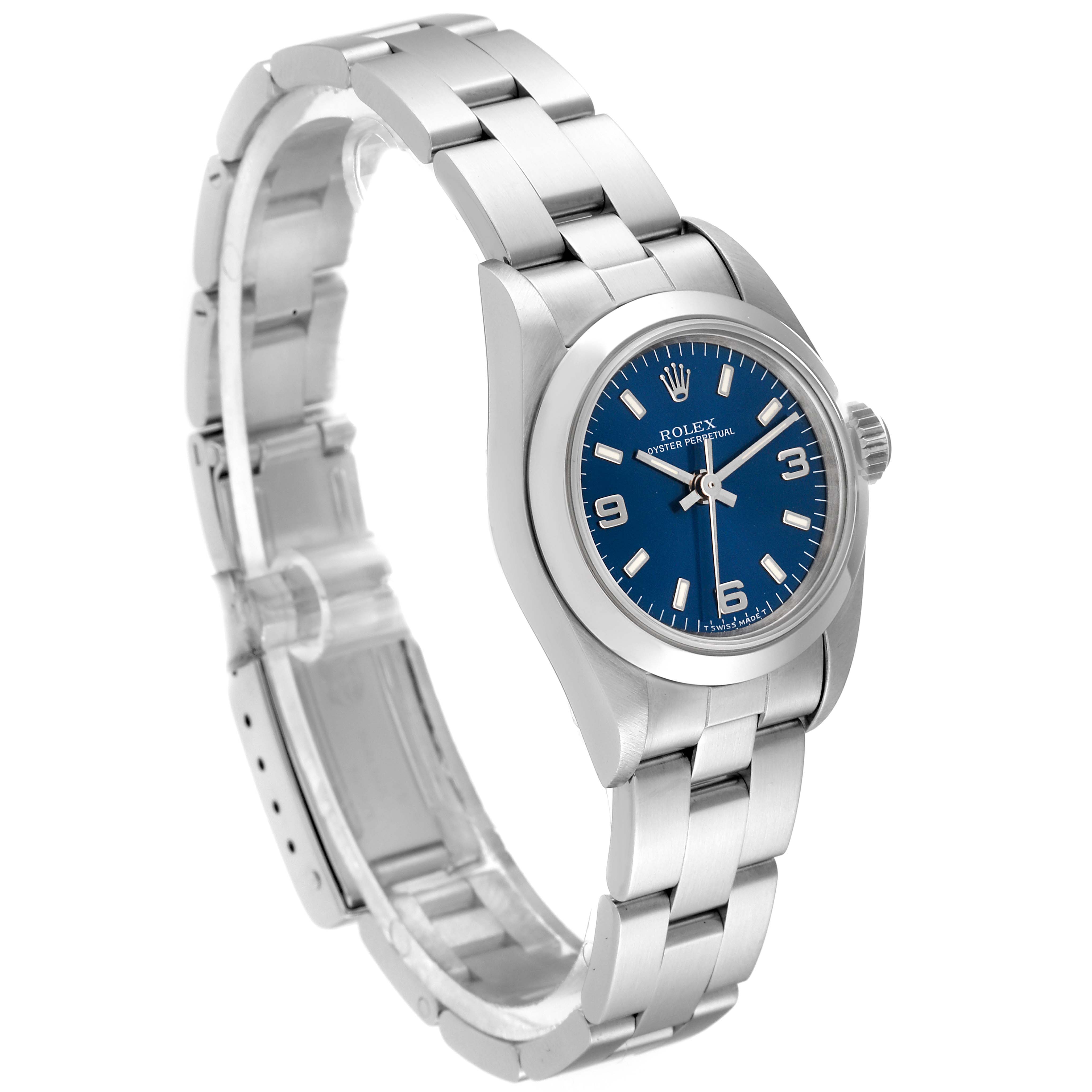 This image shows a Rolex Oyster Perpetual 67180 Women's Stainless Steel Blue Dial 67180 Women's Stainless Steel Blue Dial watch at a slight angle, highlighting the blue dial, crown, and stainless steel bracelet.