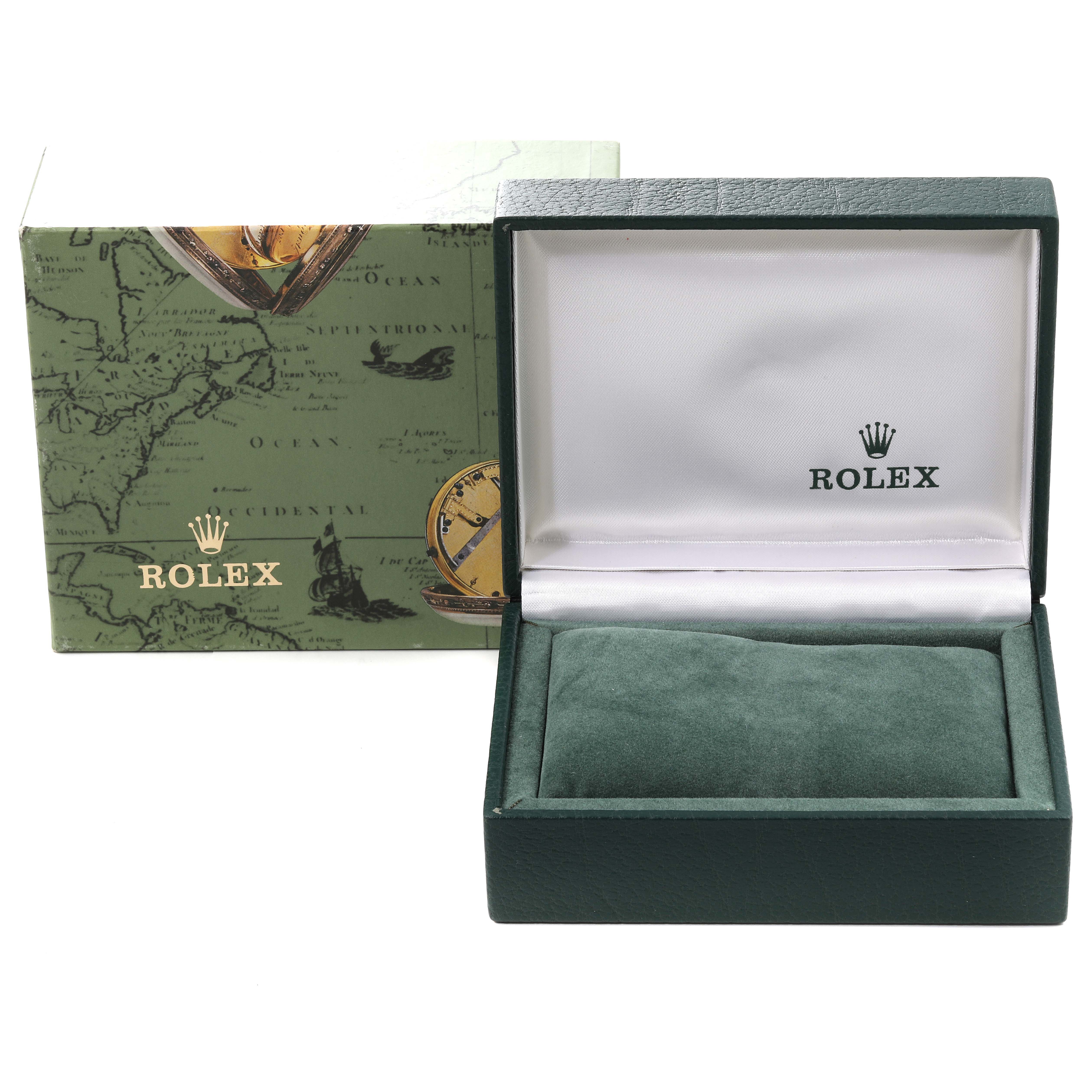 The image shows a green Rolex box for the Oyster Perpetual model, partially open, with a decorative outer box in the background.