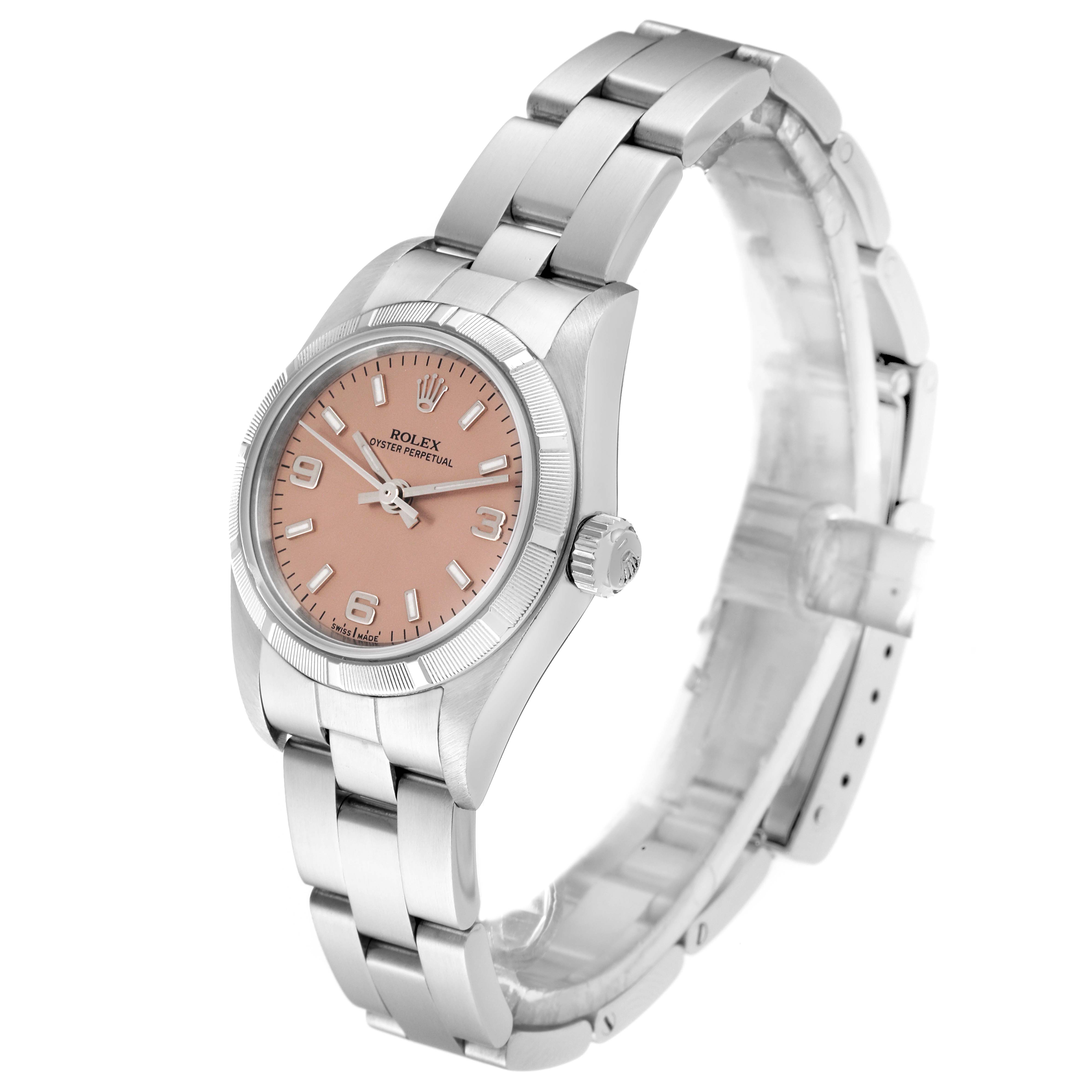 This image shows a side angle of a Rolex Oyster Perpetual 76030 Women
s Stainless Steel Pink Dial 76030 Women
s Stainless Steel Pink Dial watch, highlighting its pink dial and stainless steel bracelet.