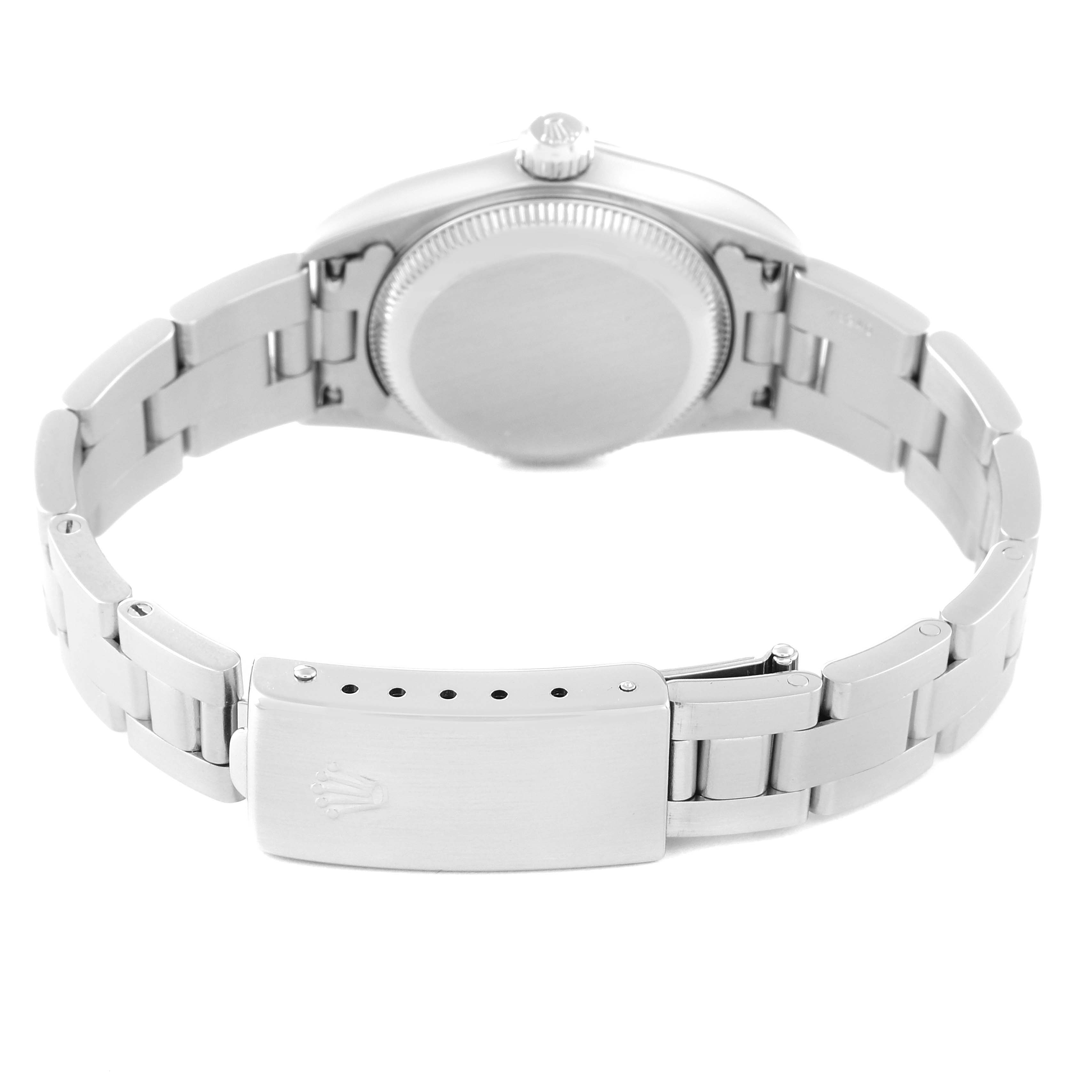 The image shows the back case, crown, and clasp of a Rolex Oyster Perpetual 76080 Women's Stainless Steel Orange Dial 76080 Women's Stainless Steel Orange Dial watch from an overhead angle.