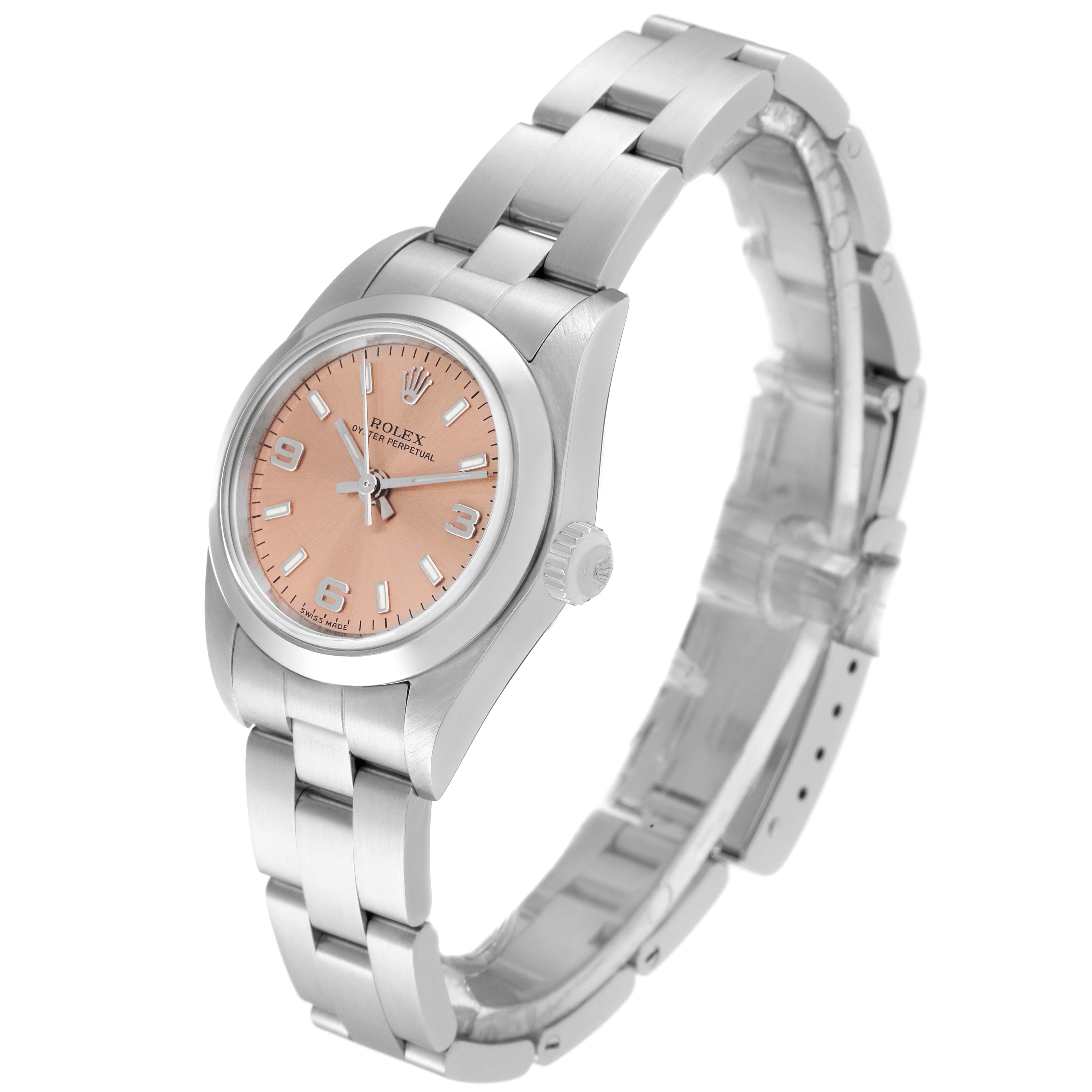 The image shows a Rolex Oyster Perpetual 76080 Women's Stainless Steel Orange Dial 76080 Women's Stainless Steel Orange Dial watch with a pink dial, viewed from an angle displaying its face and bracelet.