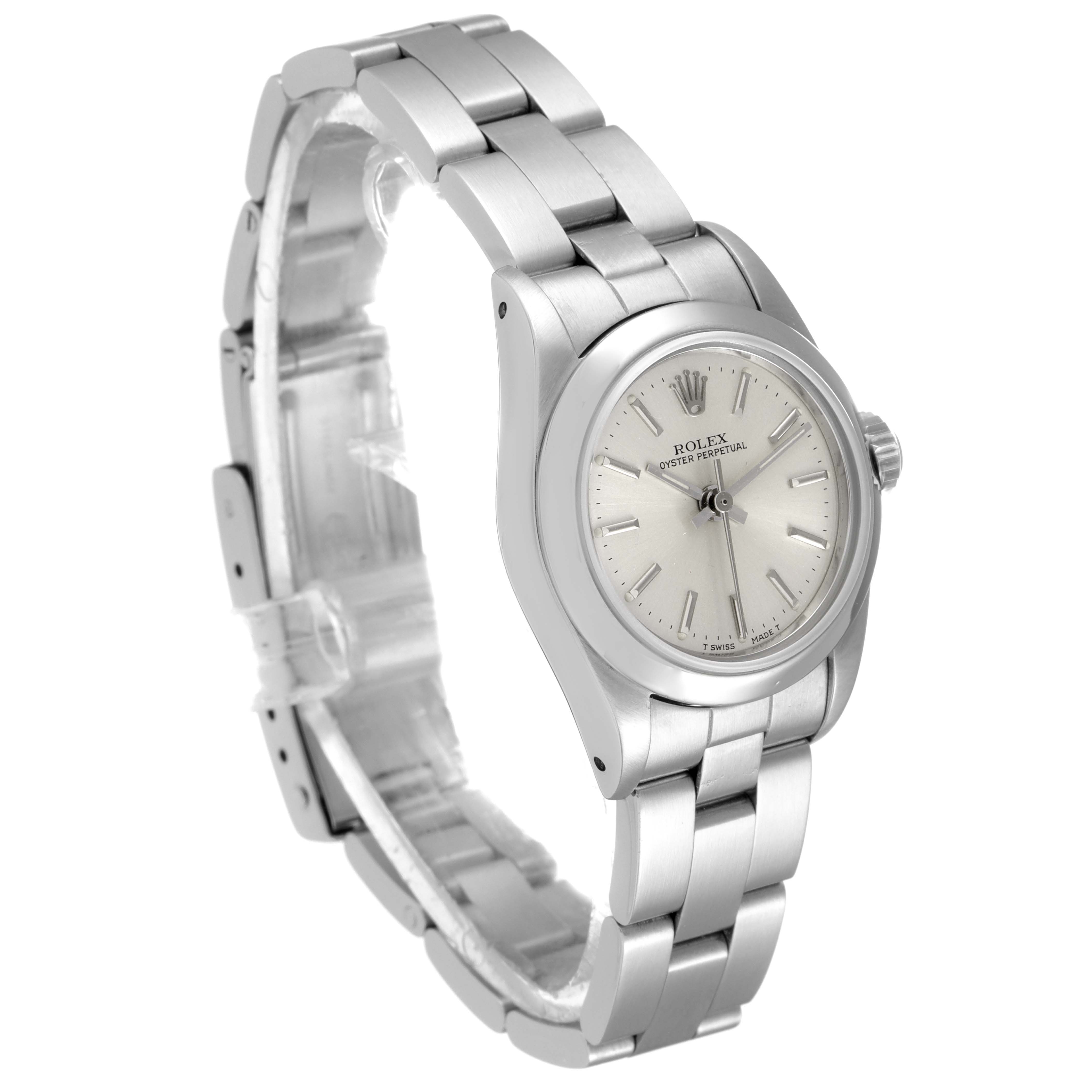 The Rolex Oyster Perpetual 67230 Women's Stainless Steel Silver Dial 67230 Women's Stainless Steel Silver Dial watch is shown from a three-quarter angle, displaying the face, bracelet, and side profile.