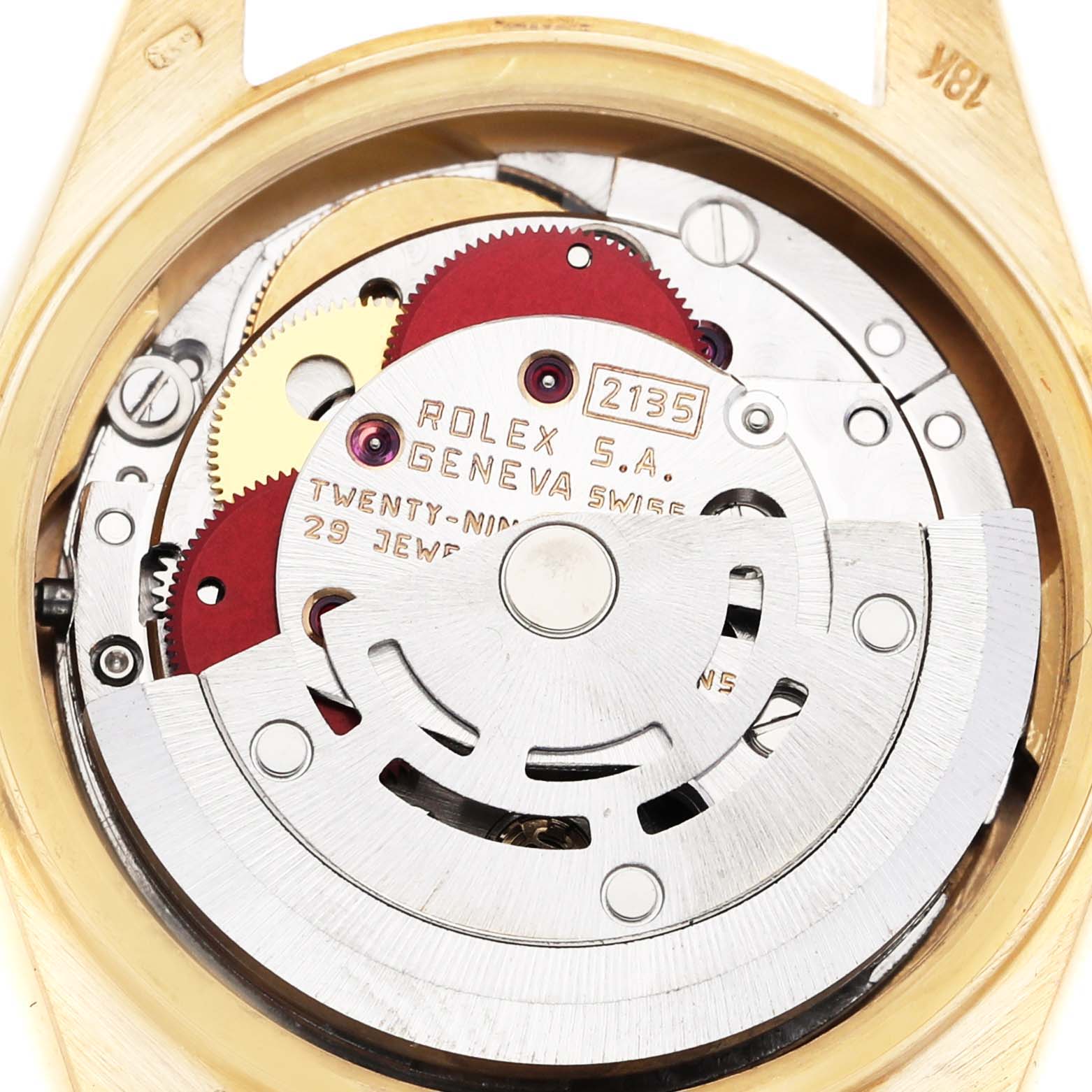 This image shows the inner mechanism of a Rolex President 69068 Women's Yellow Gold Champagne Dial 69068 Women's Yellow Gold Champagne Dial model watch, focusing on the movement's gears and components.
