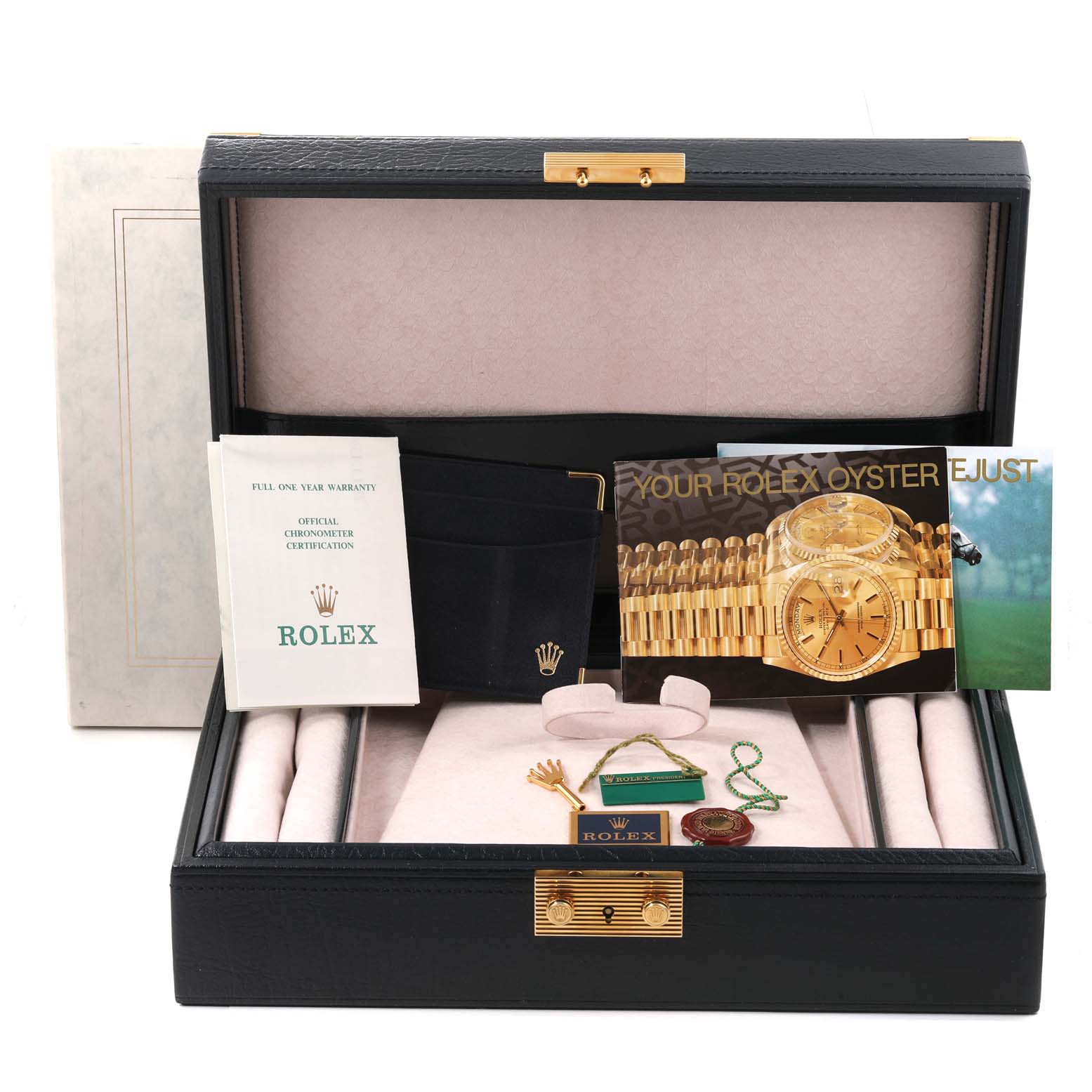 The image shows a Rolex President 69068 Women's Yellow Gold Champagne Dial 69068 Women's Yellow Gold Champagne Dial model watch box set, containing manuals, warranty cards, and other accessories.