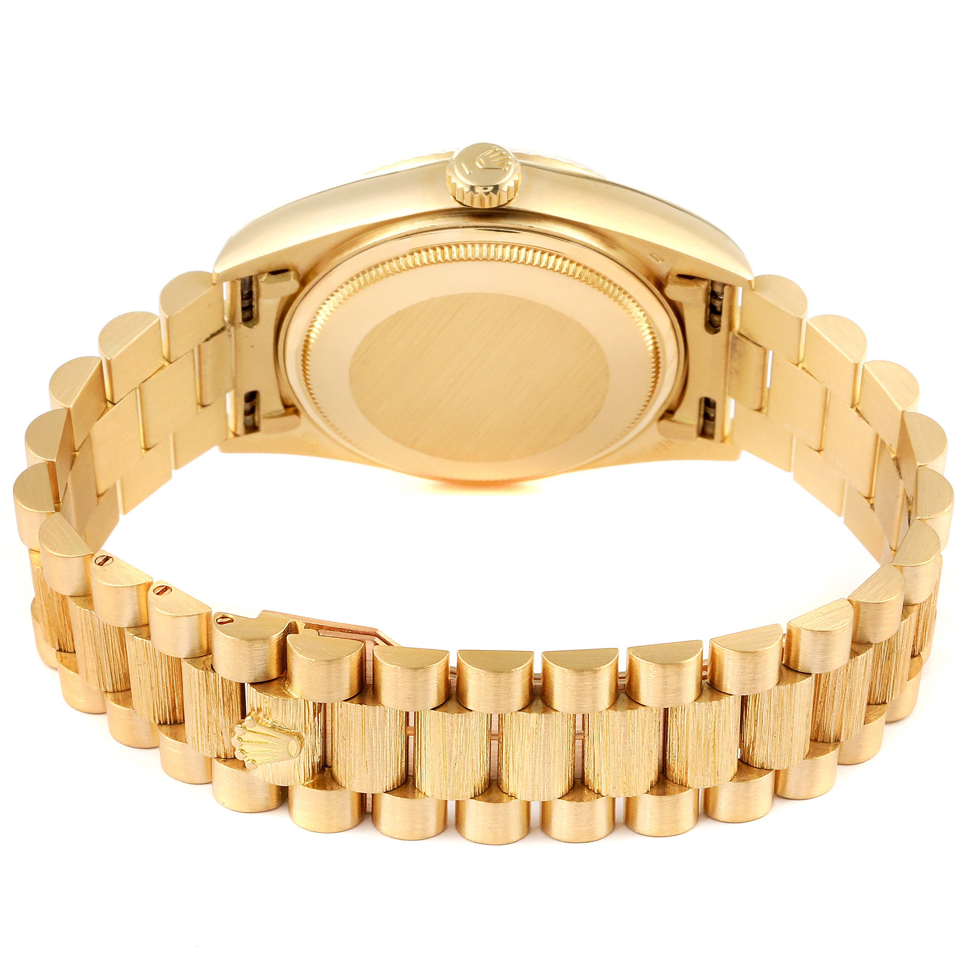 This image shows the back of a Rolex President 18078 Men
s Yellow Gold Black Dial 18078 Men
s Yellow Gold Black Dial model watch, featuring its case back and bracelet.