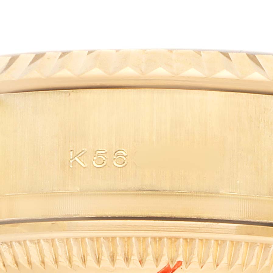 The image shows a close-up of the engraved side of a Rolex President 179238 Women's Yellow Gold Mother of Pearl Dial watch, focusing on the bezel and case edge.