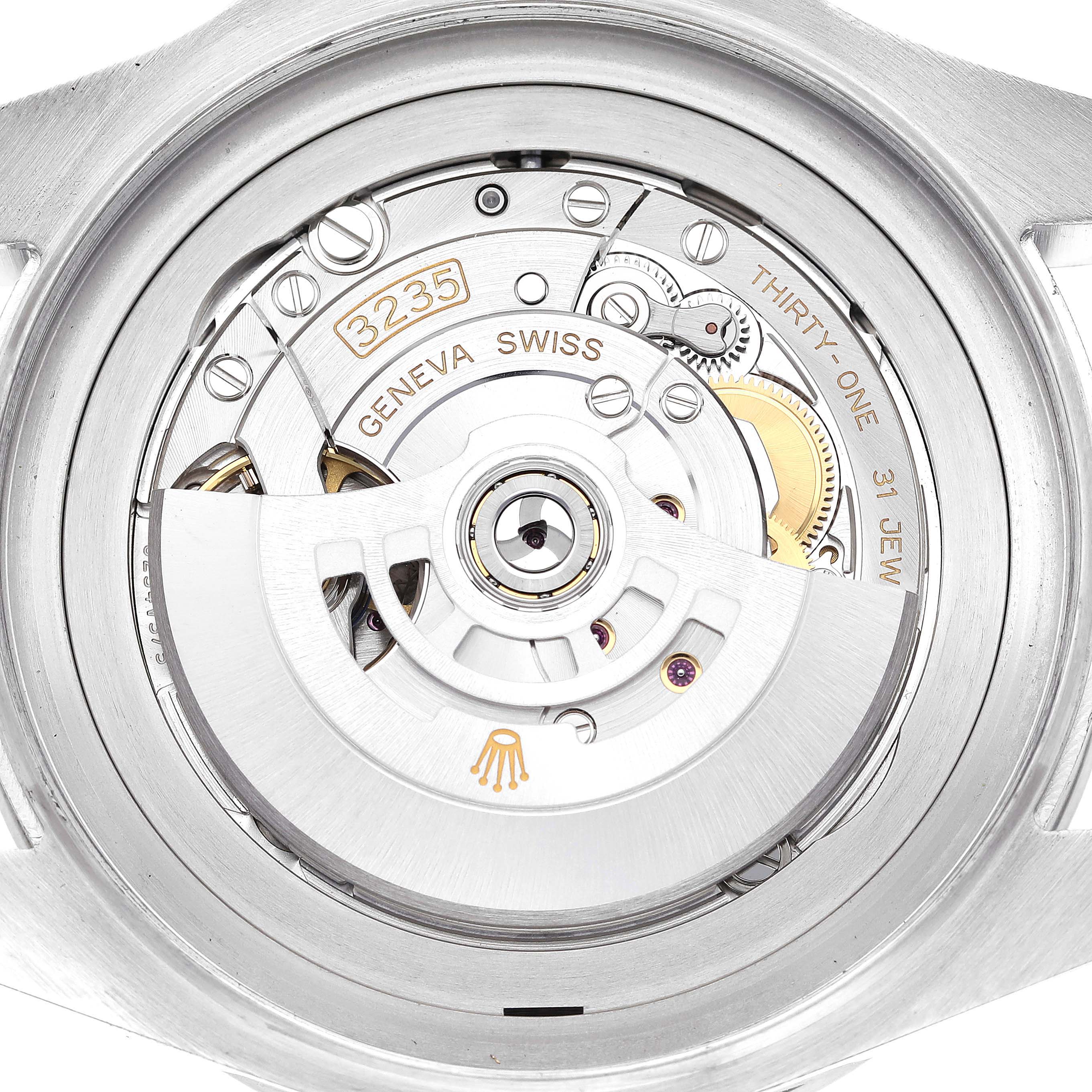 This image shows the movement mechanism of a Rolex Sea-Dweller 126660 Men's Stainless Steel Blue Dial 126660 Men's Stainless Steel Blue Dial watch, specifically the caliber 3235 from the backside.