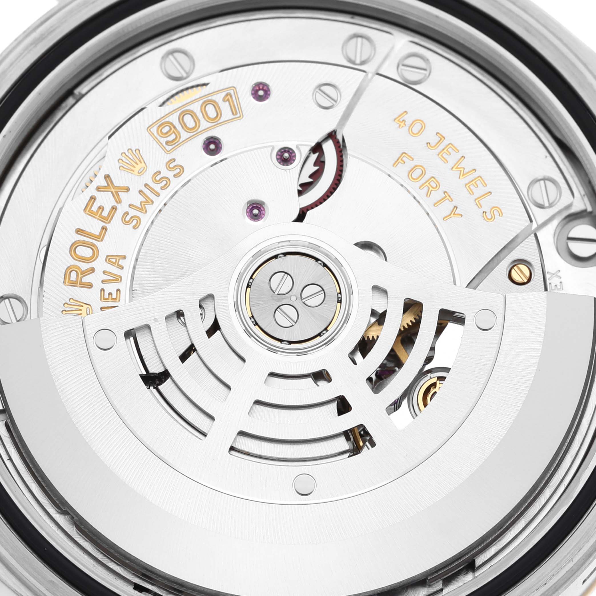 This image shows the movement mechanism of the Rolex Sky-Dweller 326933 Men
s Steel and Gold (two tone) Black Dial 326933 Men
s Steel and Gold (two tone) Black Dial watch, highlighting the rotor, gears, and jewel details.