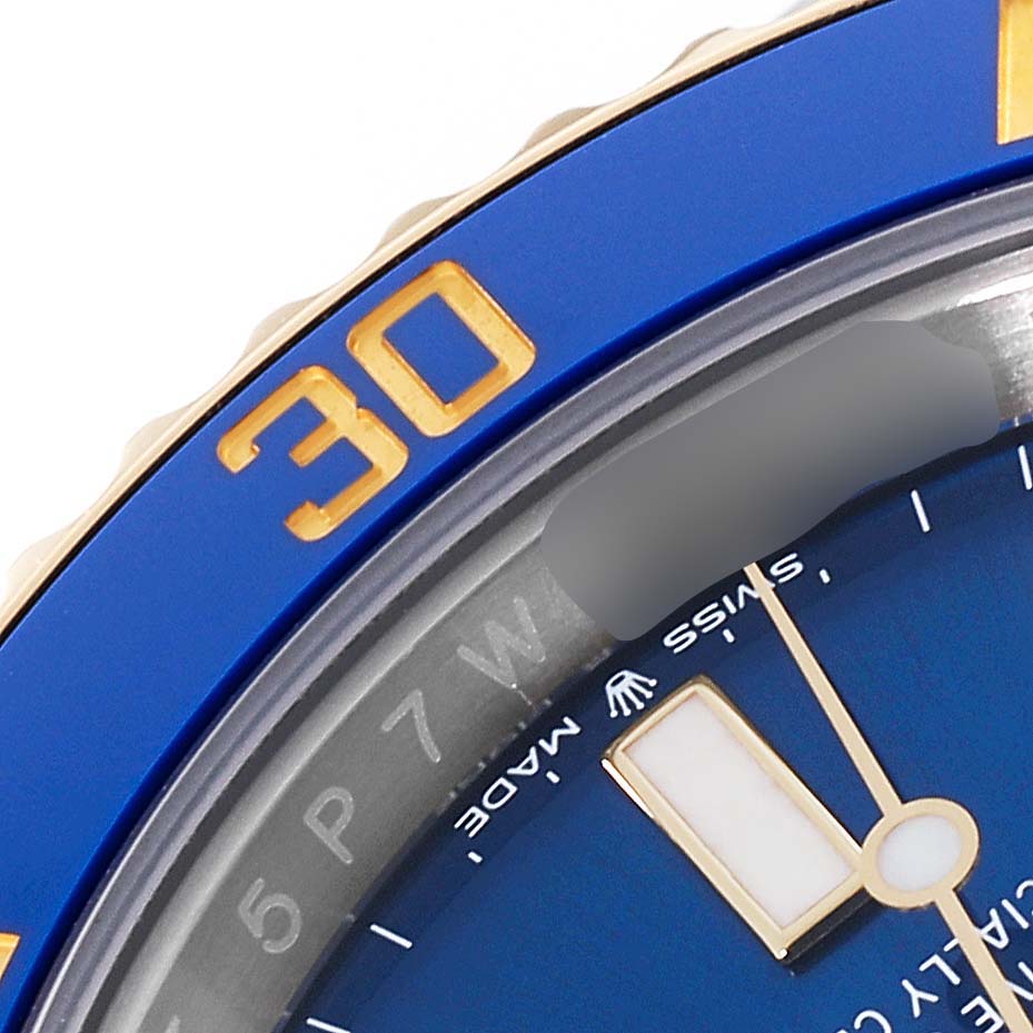 The image shows a close-up of the bezel and dial corner of a Rolex Submariner 126613LB Men's Steel and Gold (two tone) Blue Dial 126613LB Men's Steel and Gold (two tone) Blue Dial watch, focusing on the 30-minute marker.