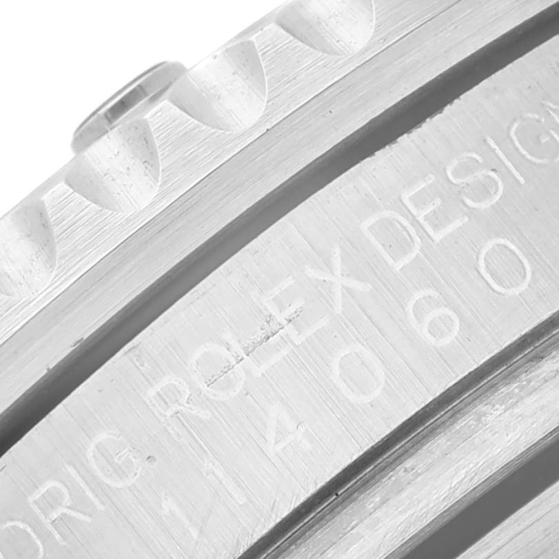 This close-up image shows the bezel and the engraved case of the Rolex Submariner 114060 Men's Stainless Steel Black Dial 114060 Men's Stainless Steel Black Dial model.