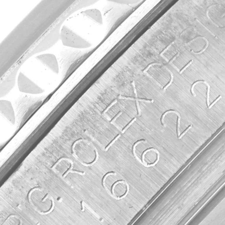 The image shows a close-up of the engraved inner bezel of a Rolex Yacht-Master 16622 Men's Stainless Steel Silver Dial 16622 Men's Stainless Steel Silver Dial watch.