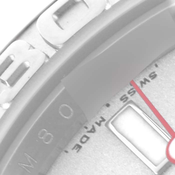 The image shows a close-up, angled view of the Rolex Yacht-Master 16622 Men's Stainless Steel Silver Dial 16622 Men's Stainless Steel Silver Dial’s bezel and part of the dial.