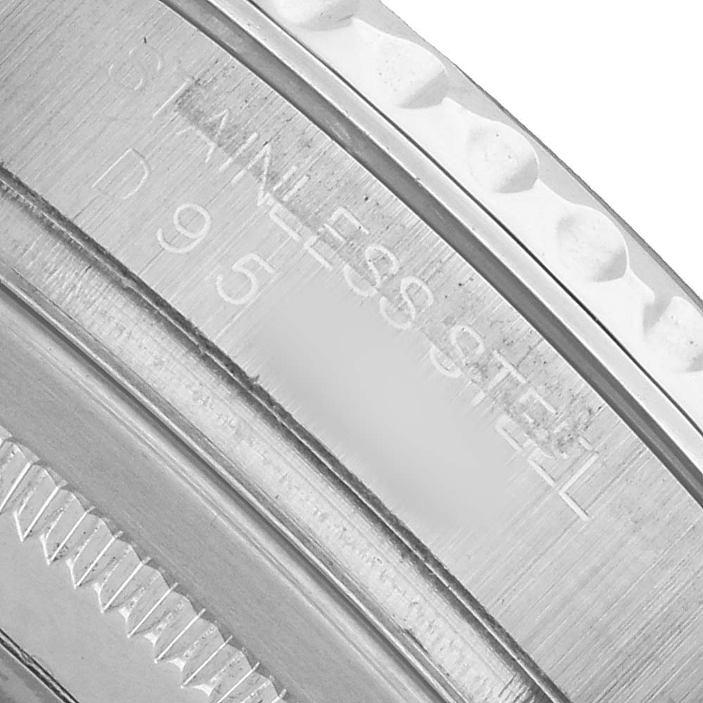 The image shows a close-up of the bezel and edge of the Rolex Yacht-Master 16622 Men's Stainless Steel Silver Dial watch, highlighting its stainless steel material.